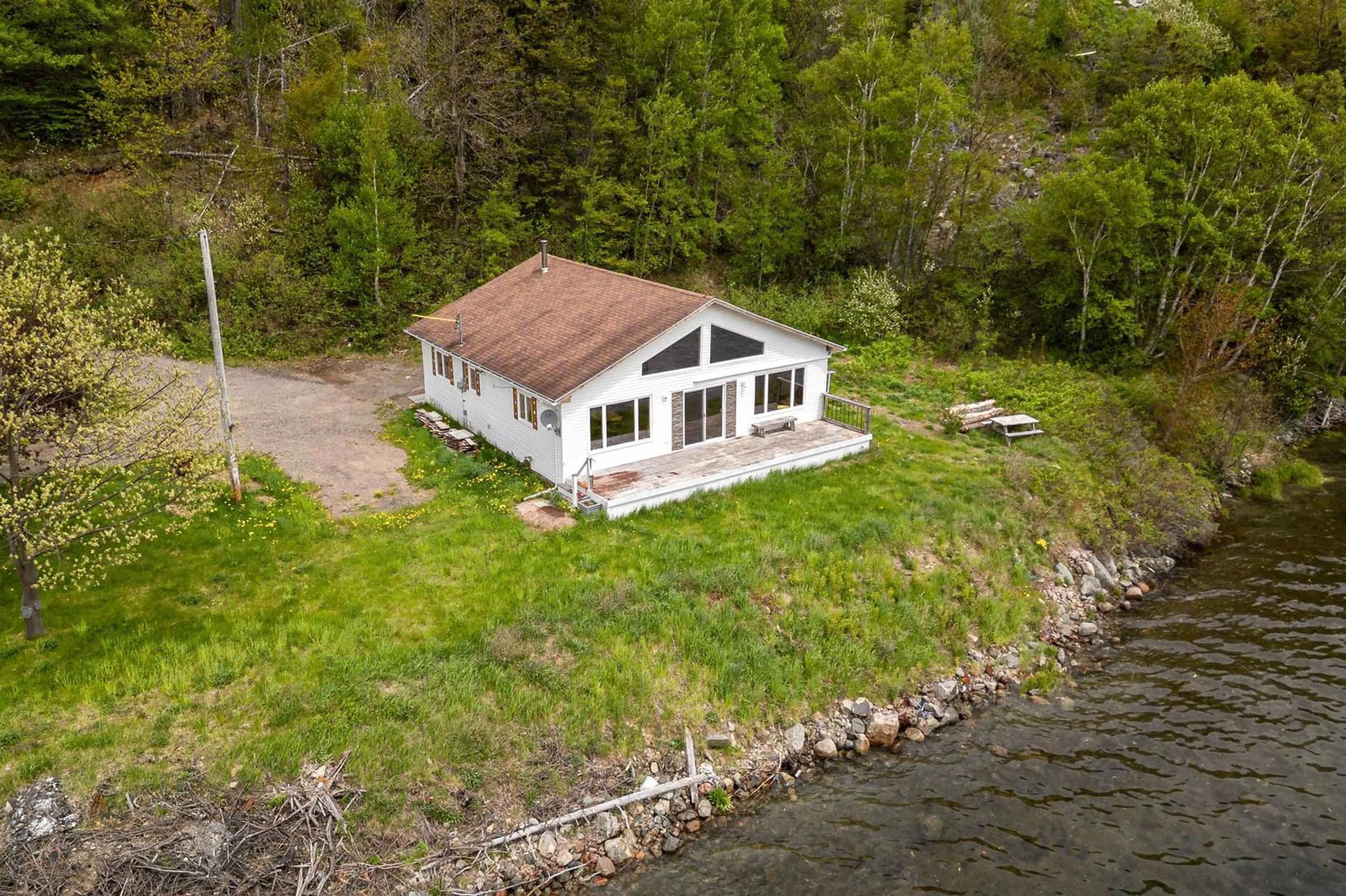 A pic from outside/outdoor area/front of a property/back of a property/a pic from drone, water/lake/river/ocean view for 38103 Cabot Trail, Ingonish Nova Scotia B0C 1L0