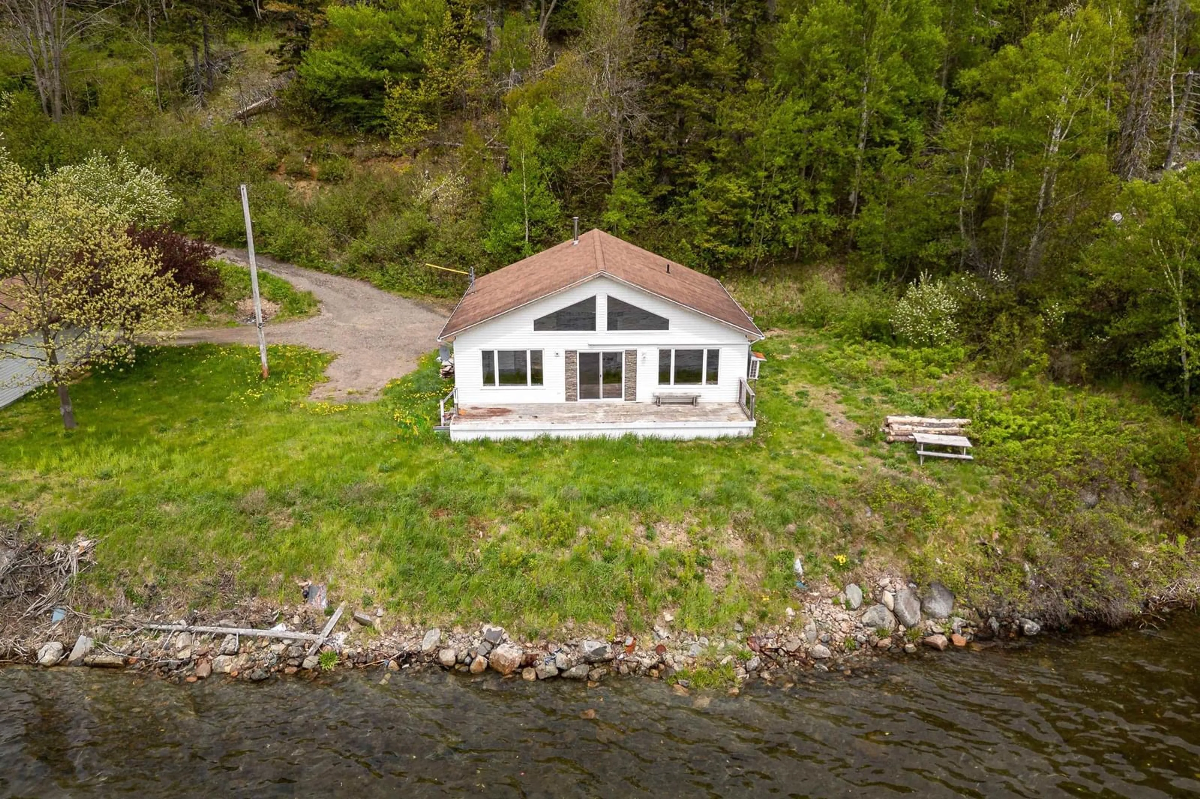 A pic from outside/outdoor area/front of a property/back of a property/a pic from drone, water/lake/river/ocean view for 38103 Cabot Trail, Ingonish Nova Scotia B0C 1L0