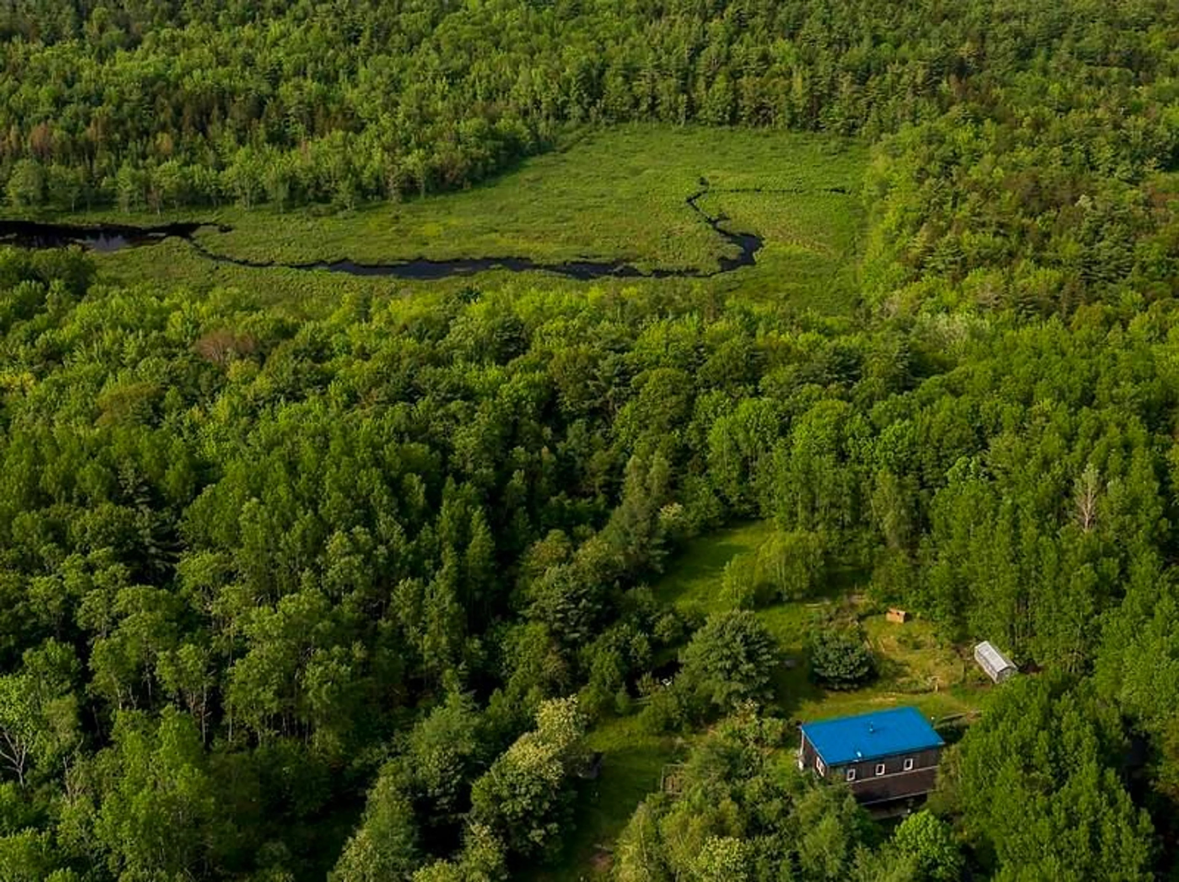A pic from outside/outdoor area/front of a property/back of a property/a pic from drone, forest/trees view for 1749 Northwest Rd, Blockhouse Nova Scotia B0J 2C0
