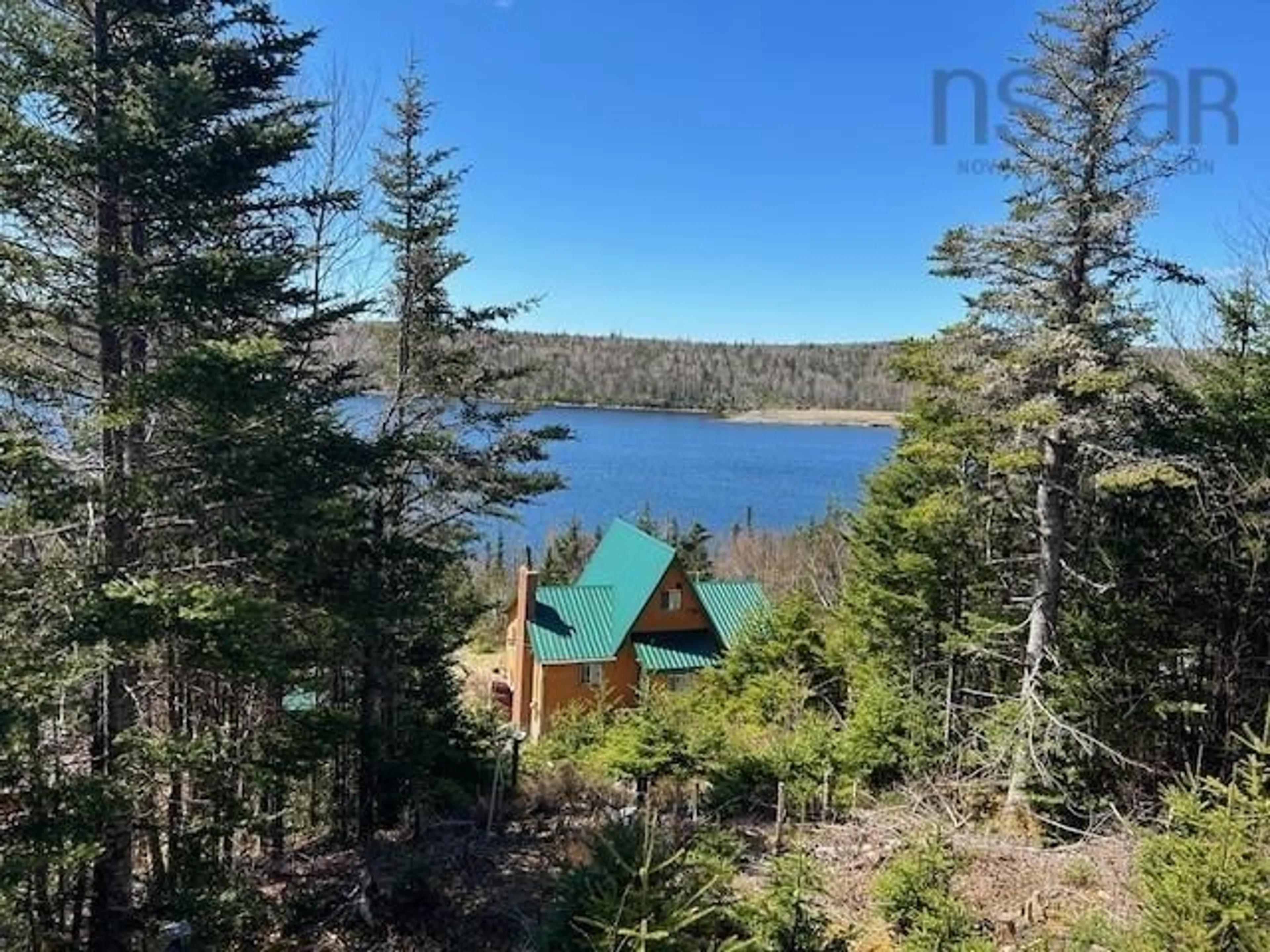 A pic from outside/outdoor area/front of a property/back of a property/a pic from drone, water/lake/river/ocean view for 115 Church Point Rd, Sheet Harbour Nova Scotia B0J 3B0