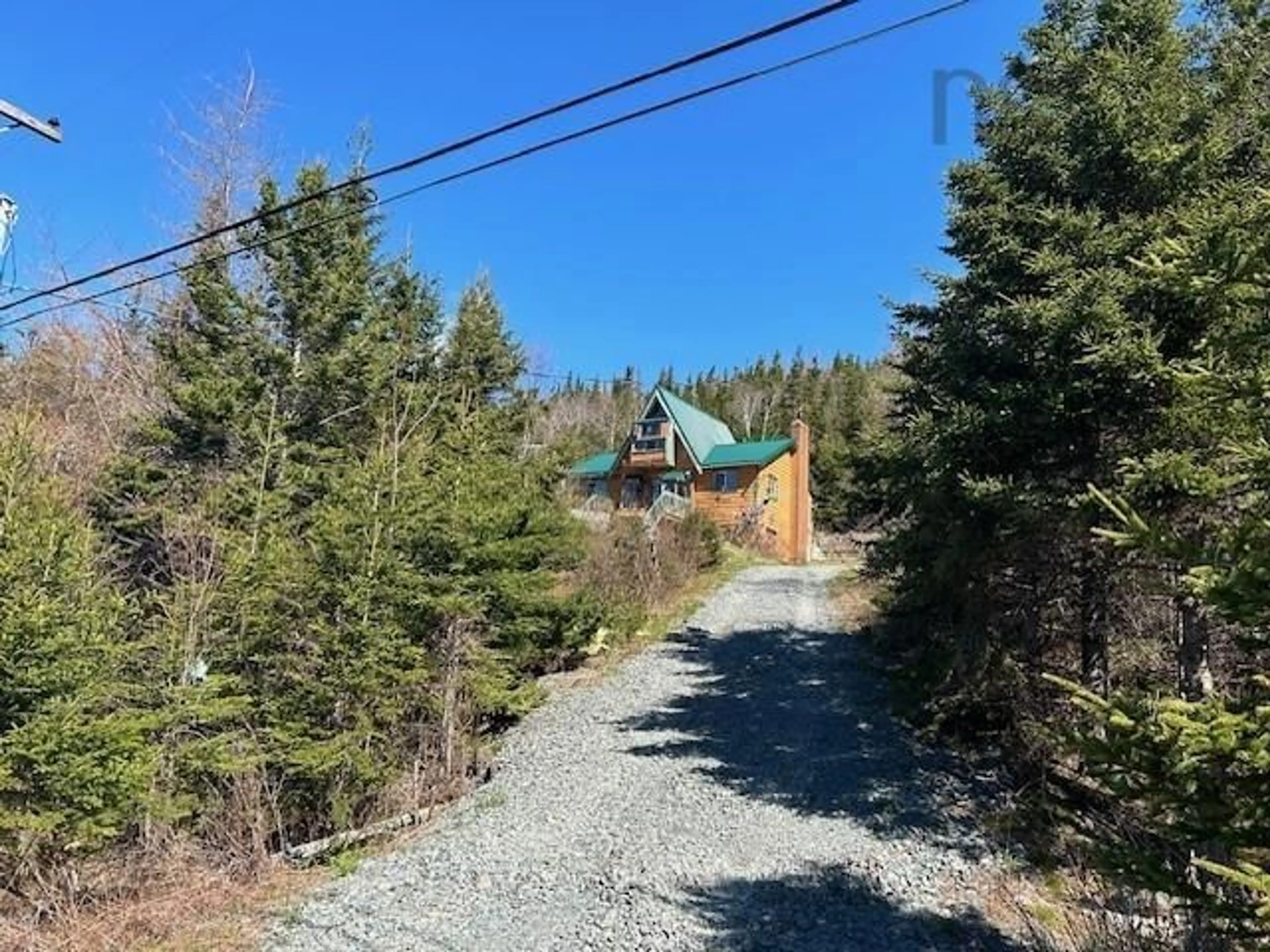 A pic from outside/outdoor area/front of a property/back of a property/a pic from drone, forest/trees view for 115 Church Point Rd, Sheet Harbour Nova Scotia B0J 3B0