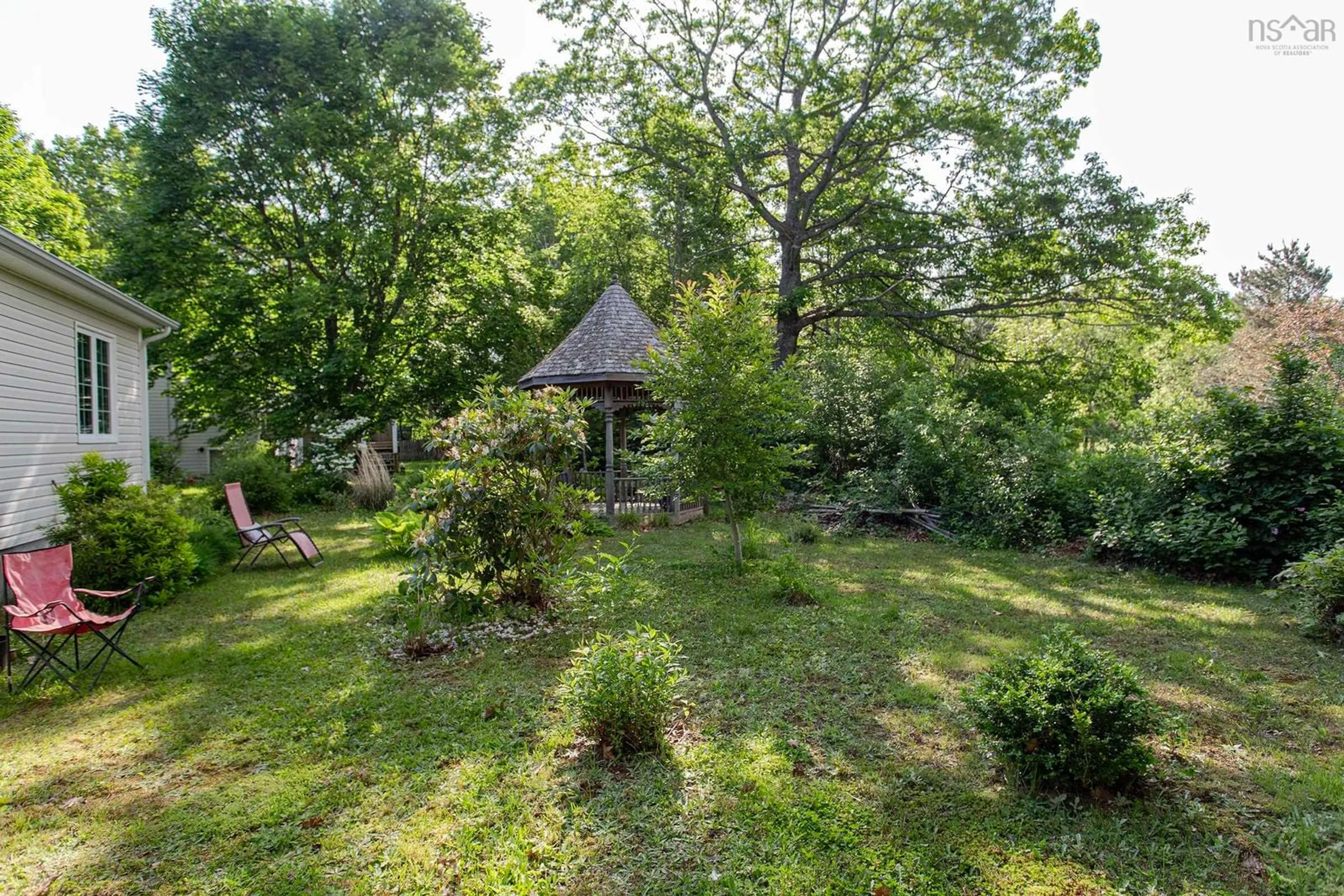 A pic from outside/outdoor area/front of a property/back of a property/a pic from drone, forest/trees view for 24 Martyn Cres, Nictaux Nova Scotia B0S 1P0