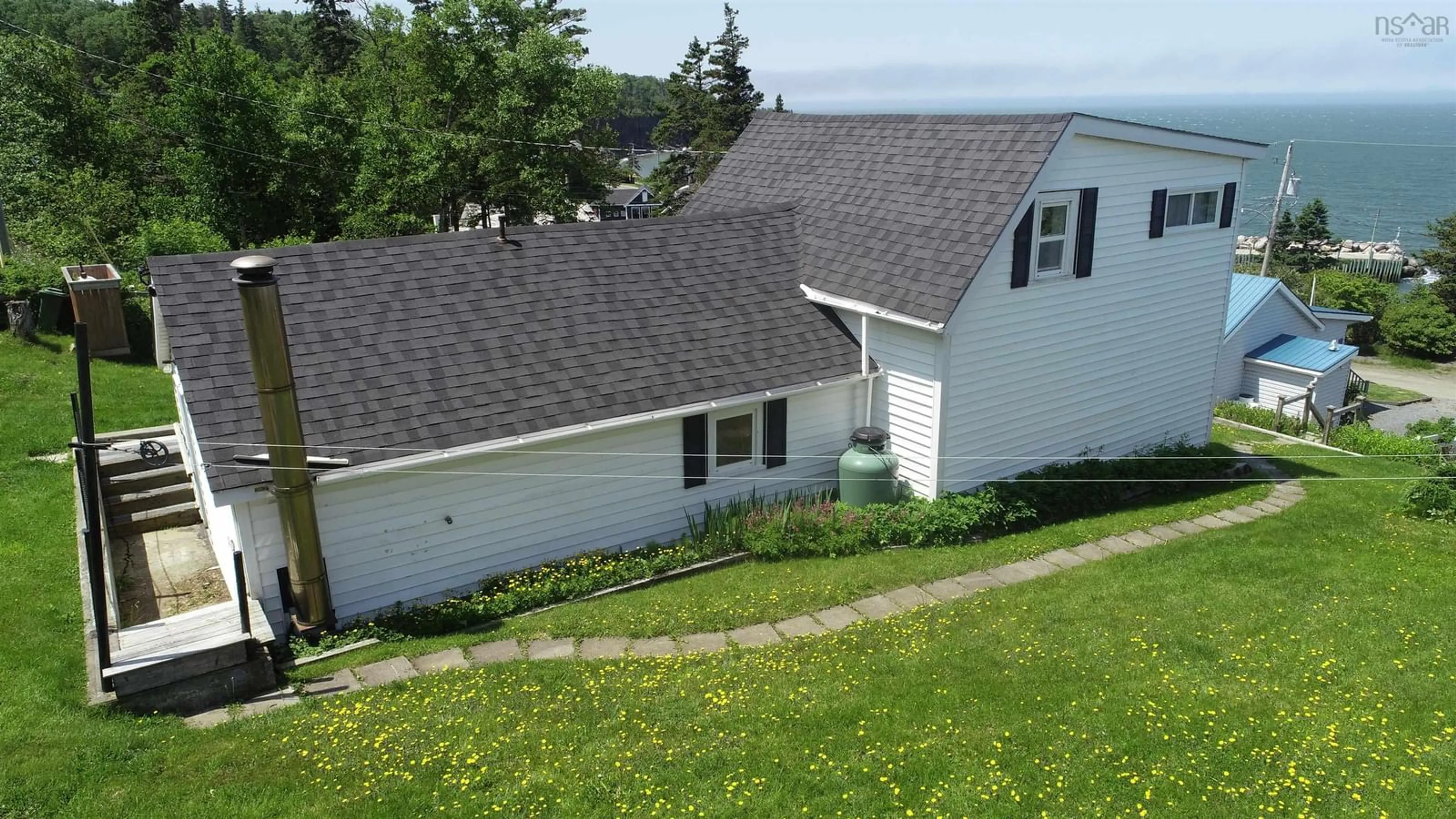 A pic from outside/outdoor area/front of a property/back of a property/a pic from drone, street for 4156 Highway 359, Halls Harbour Nova Scotia B0P 1J0