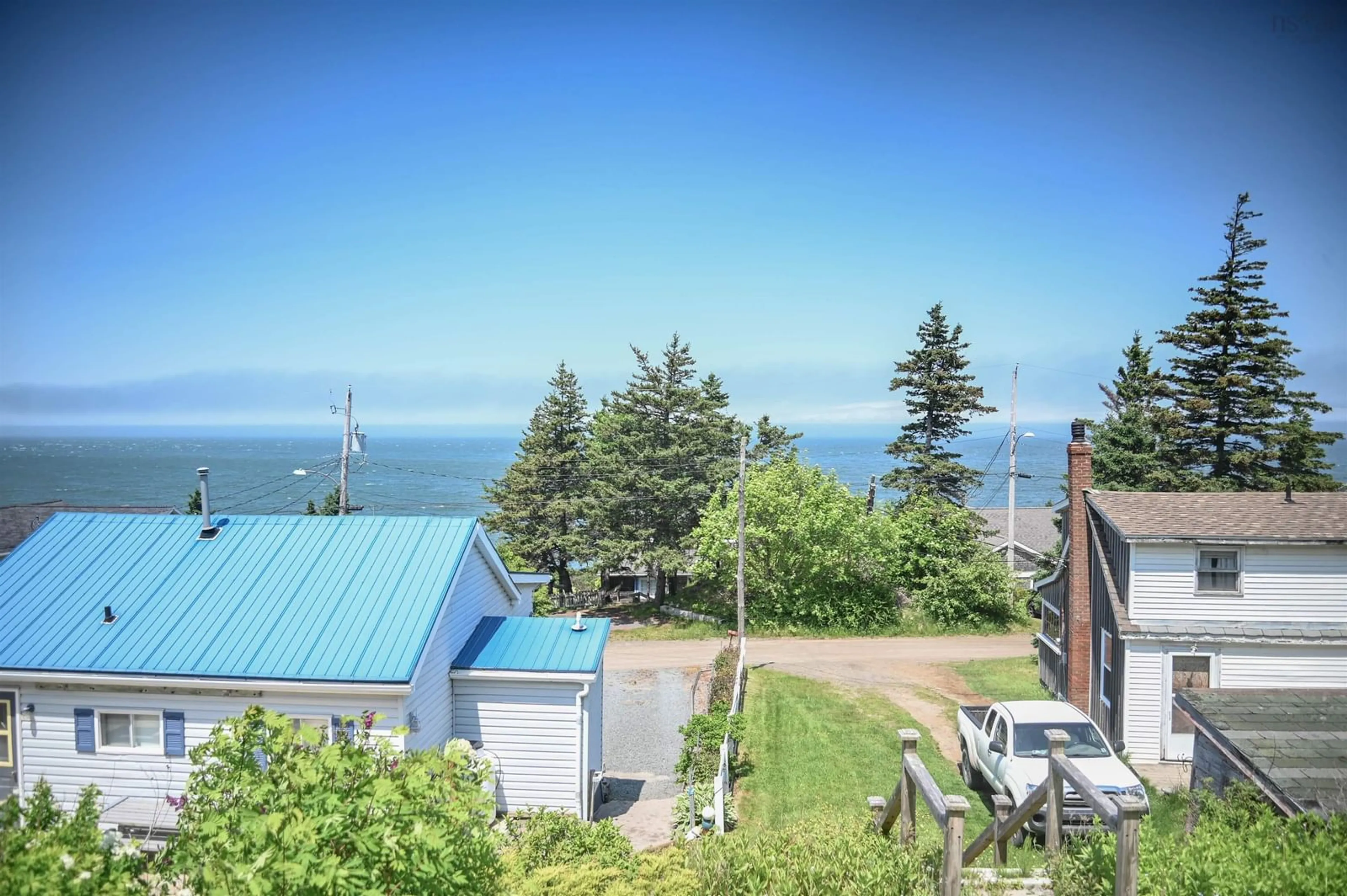 A pic from outside/outdoor area/front of a property/back of a property/a pic from drone, water/lake/river/ocean view for 4156 Highway 359, Halls Harbour Nova Scotia B0P 1J0