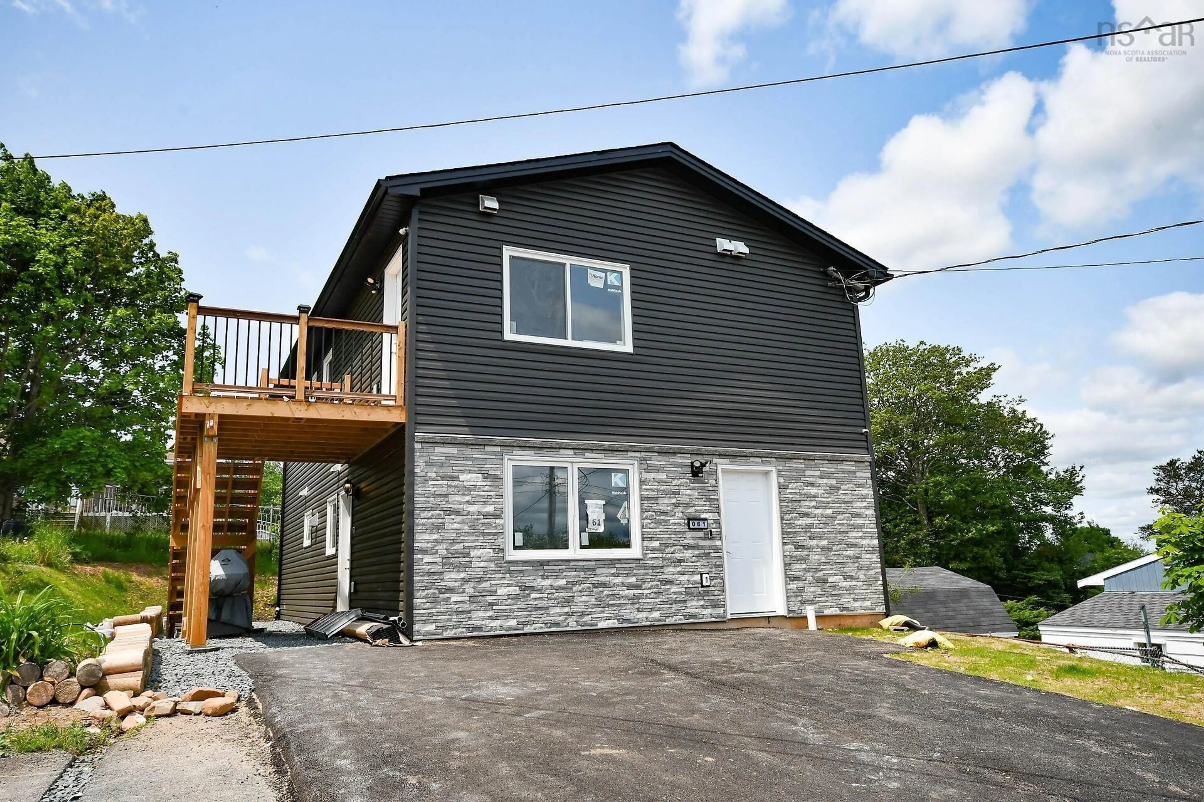 Home with vinyl exterior material, street for 61/63 Brian Dr, Dartmouth Nova Scotia B2W 3N2