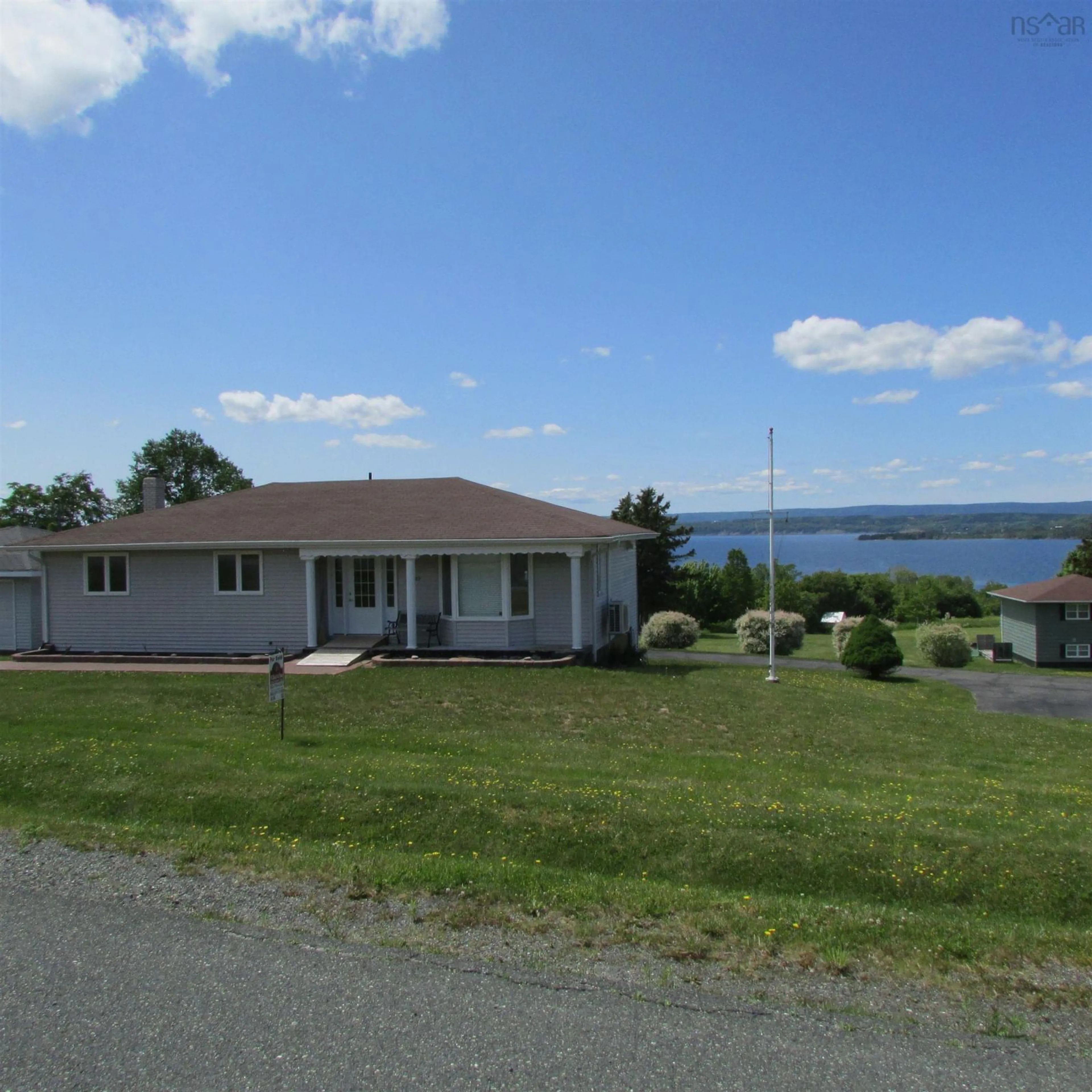 A pic from outside/outdoor area/front of a property/back of a property/a pic from drone, water/lake/river/ocean view for 25 Evelyns Ave, Georges River Nova Scotia B1Y 3G7