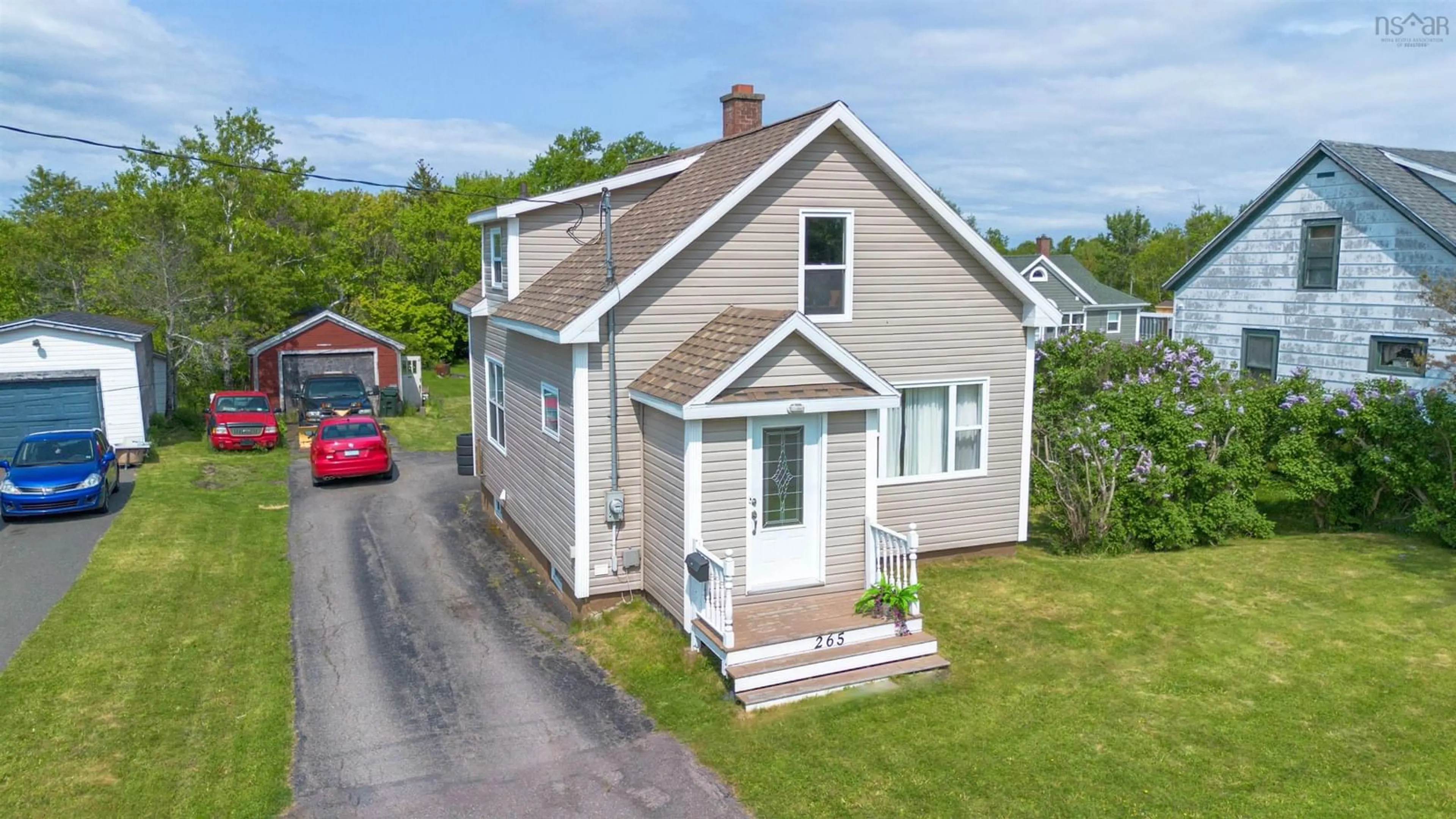 A pic from outside/outdoor area/front of a property/back of a property/a pic from drone, street for 265 Lake Rd, Glace Bay Nova Scotia B1A 2H2