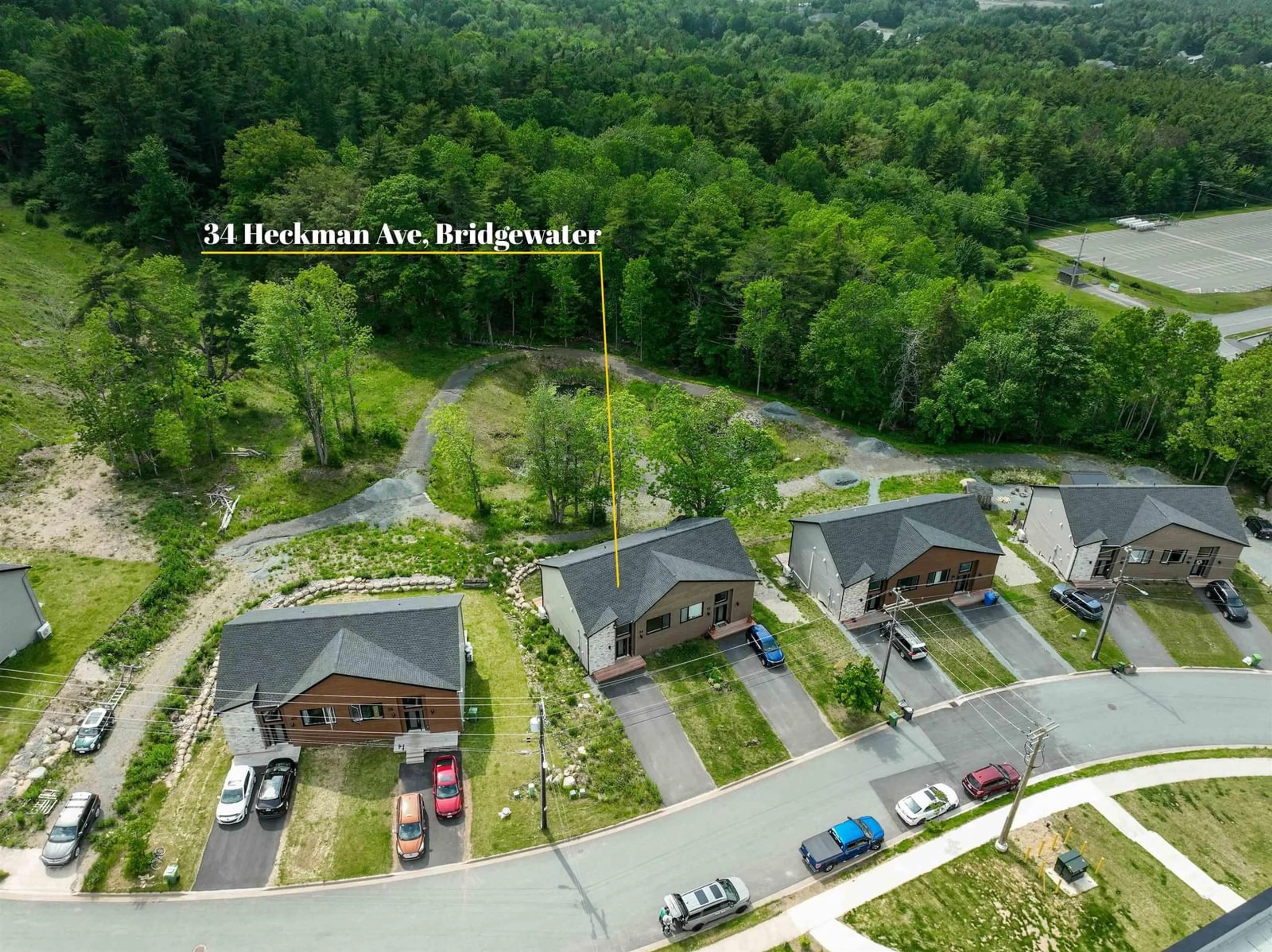 A pic from outside/outdoor area/front of a property/back of a property/a pic from drone, unknown for 34 Heckman Ave, Bridgewater Nova Scotia B4V 9G9