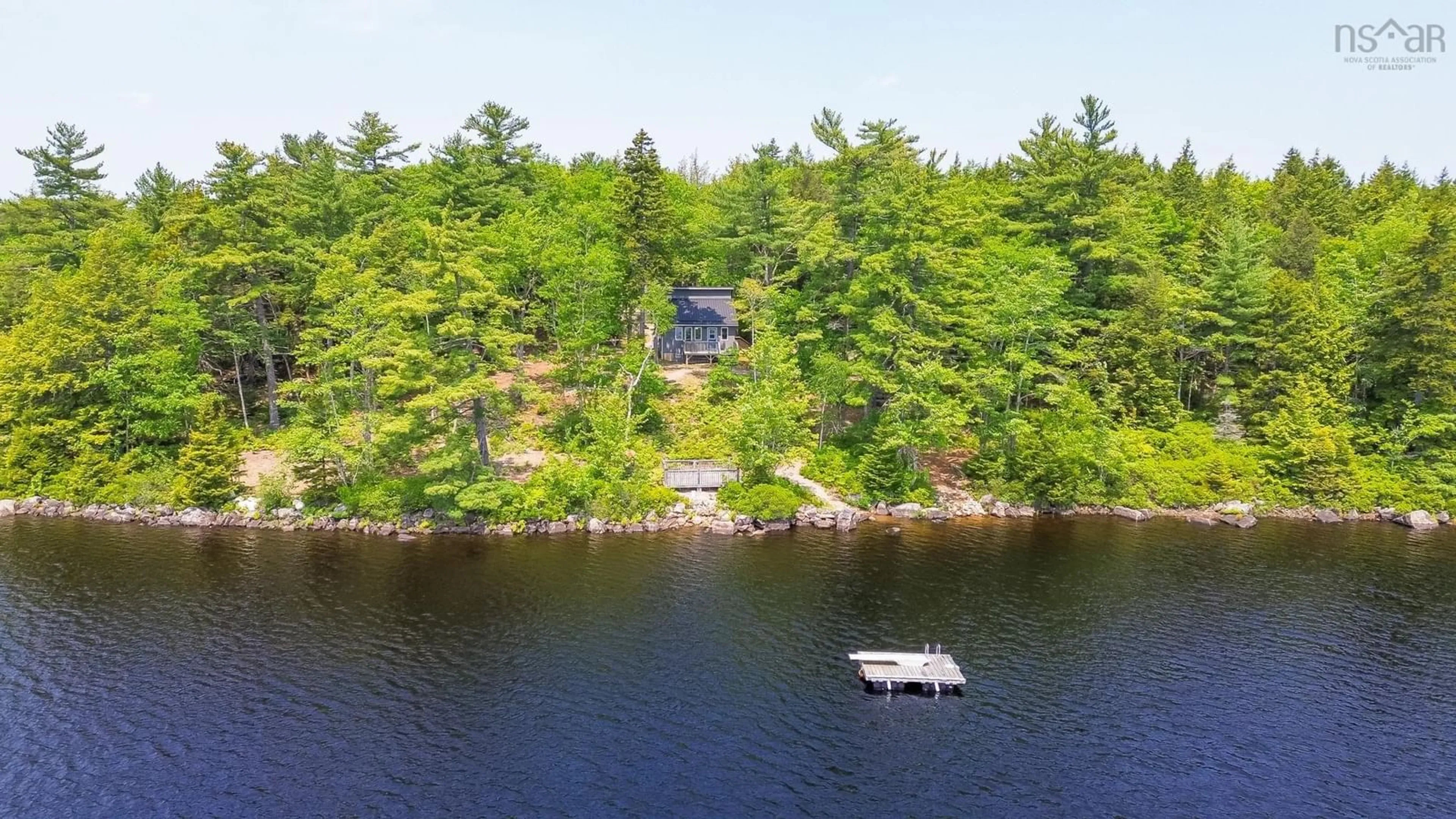 A pic from outside/outdoor area/front of a property/back of a property/a pic from drone, water/lake/river/ocean view for 404 Narrows Rd, Labelle Nova Scotia B0T 1E0