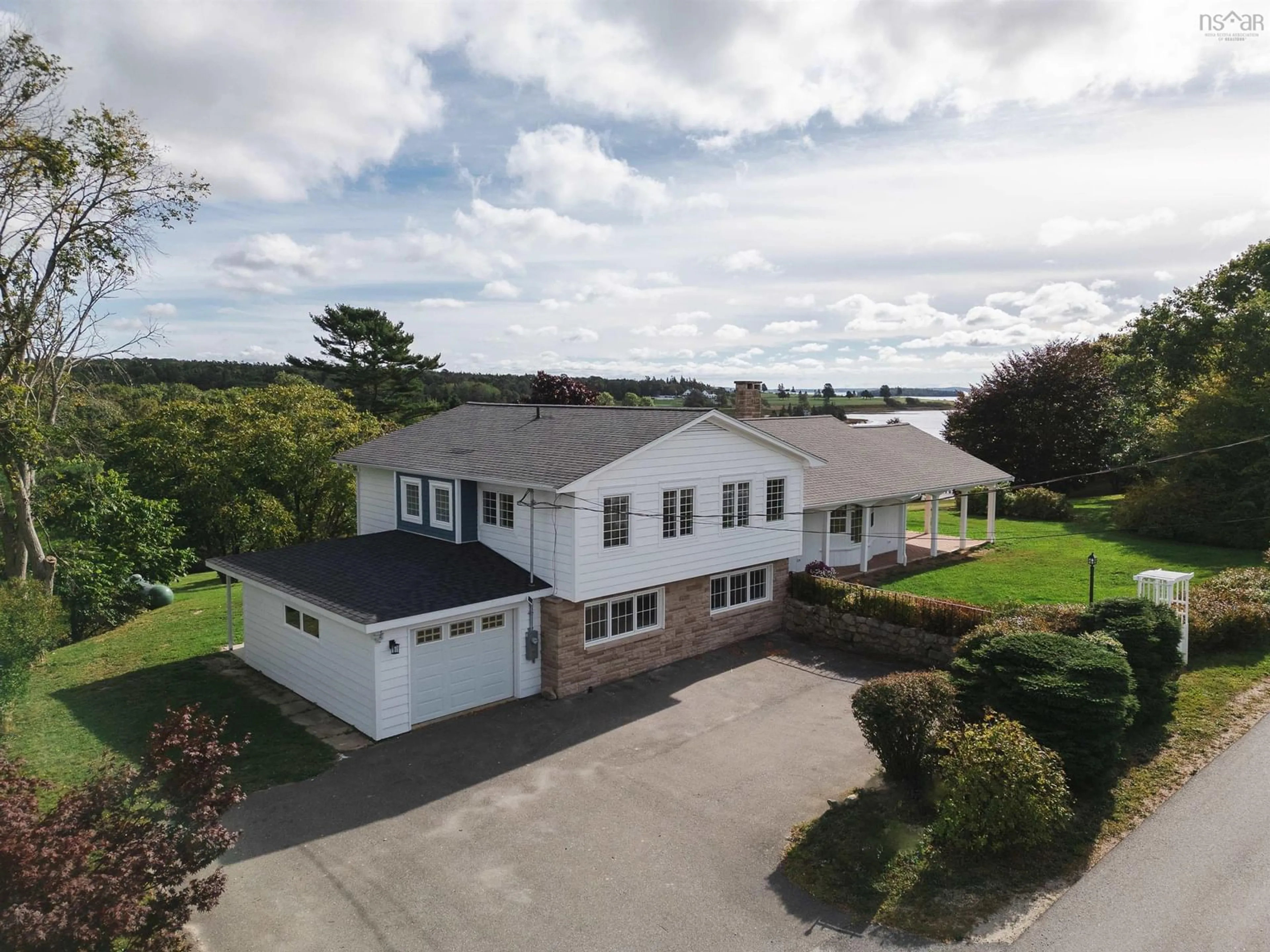 A pic from outside/outdoor area/front of a property/back of a property/a pic from drone, building for 97 Nauss Point Rd, Chester Nova Scotia B0J 1J0