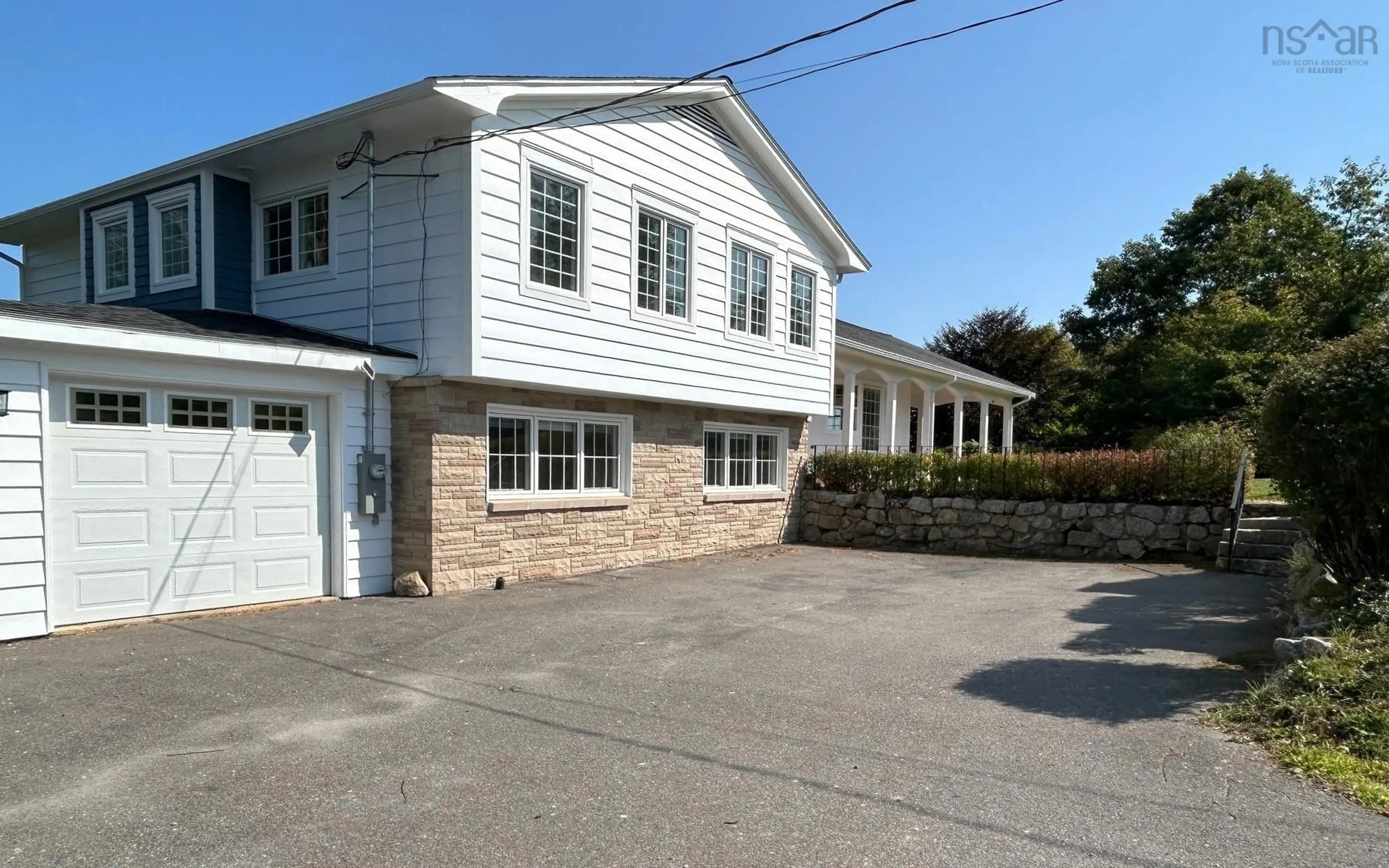 A pic from outside/outdoor area/front of a property/back of a property/a pic from drone, street for 97 Nauss Point Rd, Chester Nova Scotia B0J 1J0