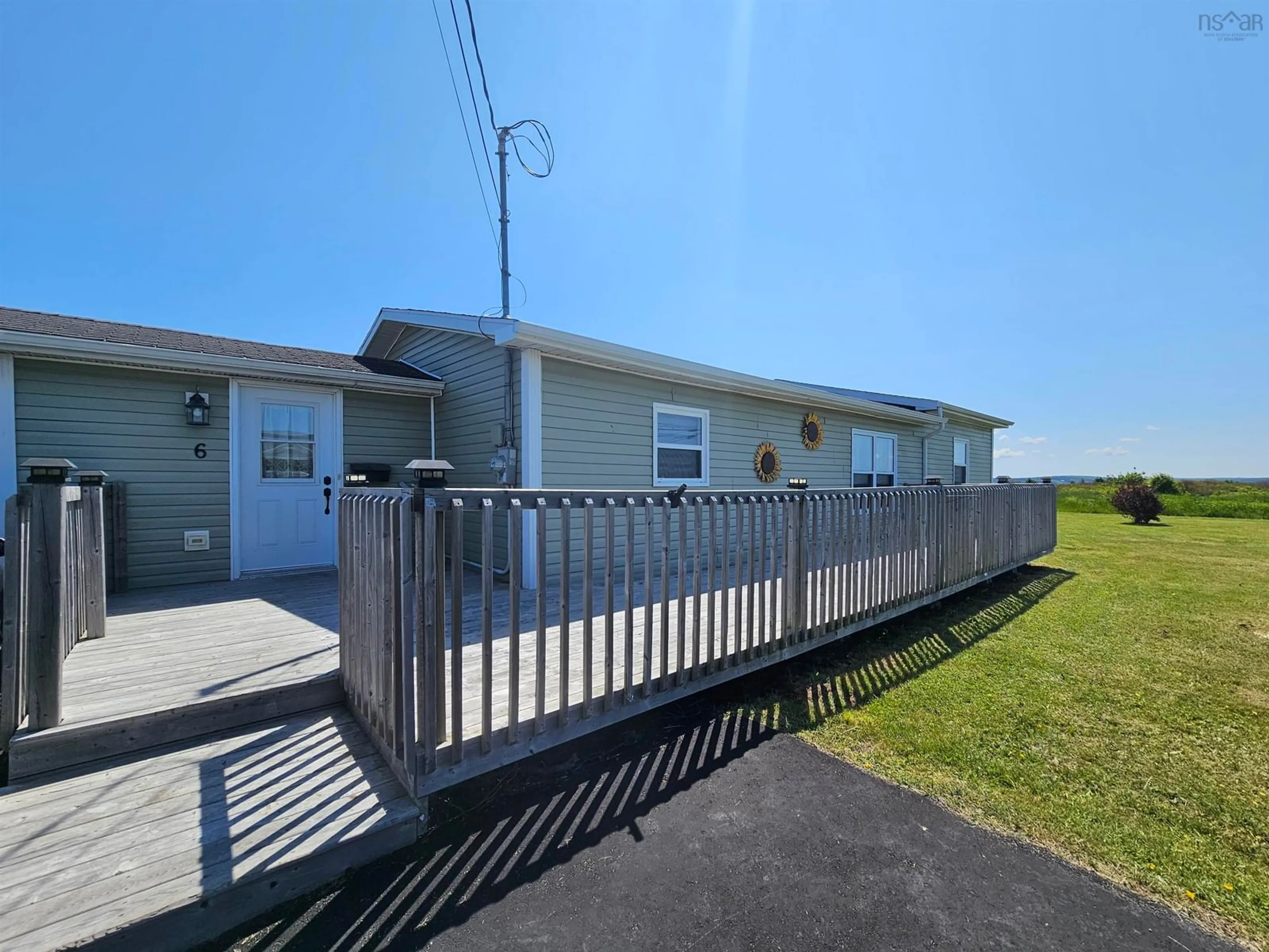 A pic from outside/outdoor area/front of a property/back of a property/a pic from drone, unknown for 6 Peck St, Sydney Mines Nova Scotia B1V 1T9