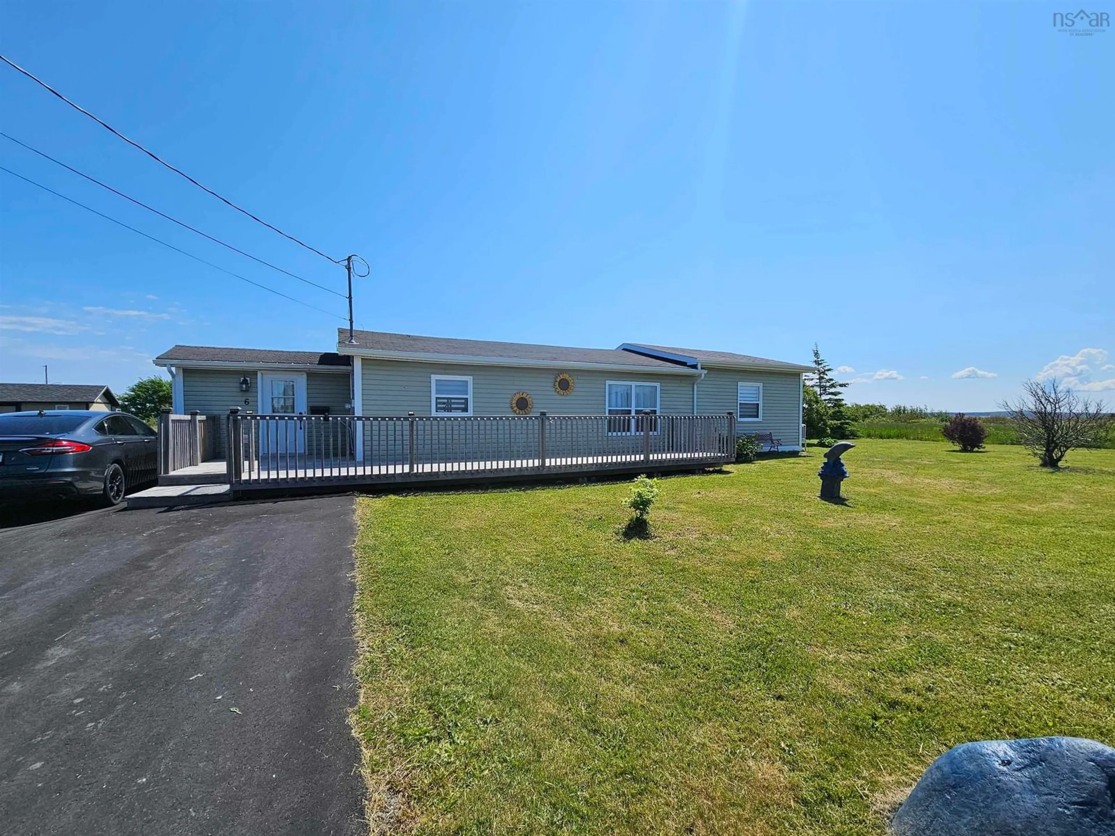 A pic from outside/outdoor area/front of a property/back of a property/a pic from drone, water/lake/river/ocean view for 6 Peck St, Sydney Mines Nova Scotia B1V 1T9