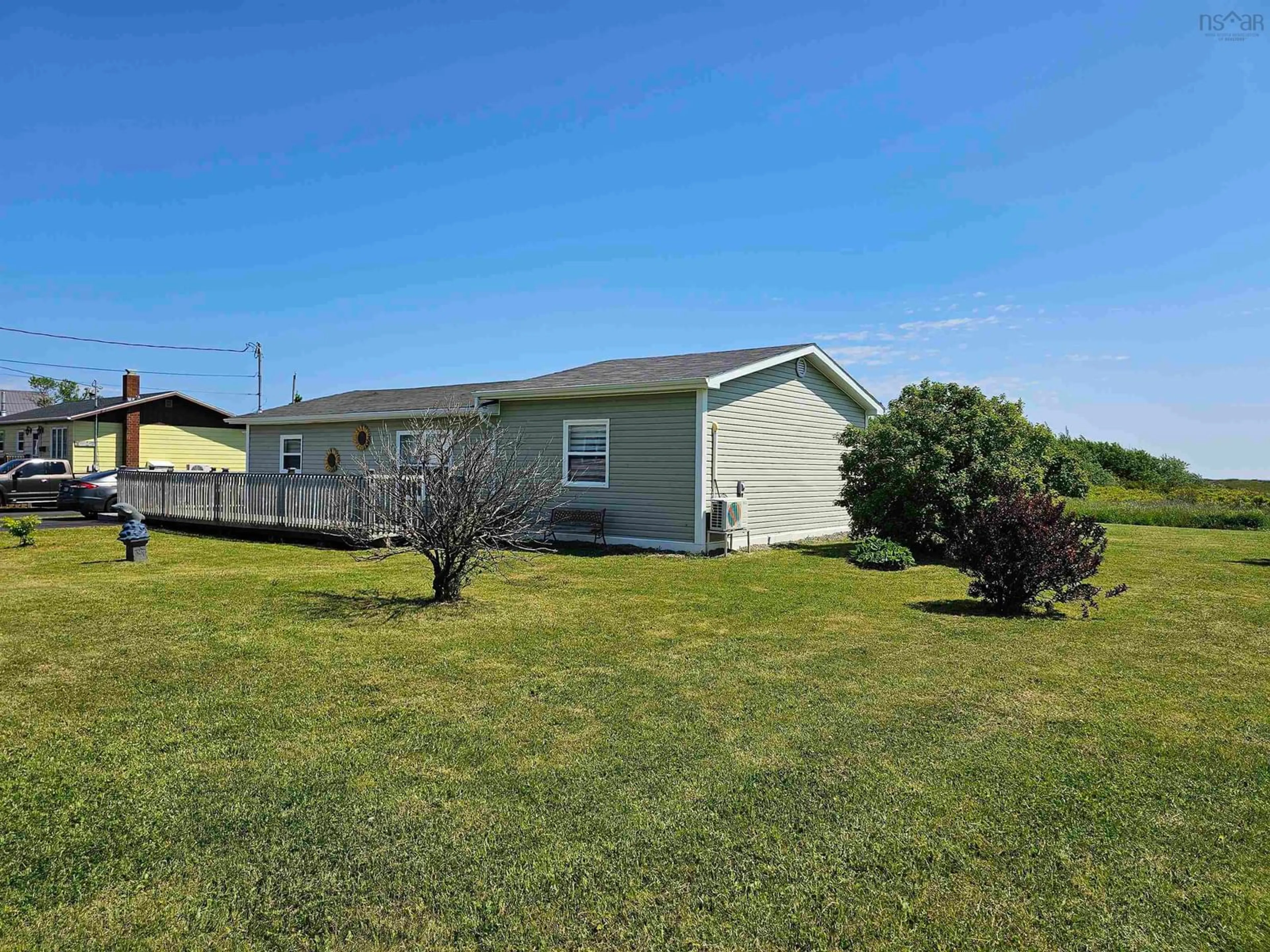 A pic from outside/outdoor area/front of a property/back of a property/a pic from drone, water/lake/river/ocean view for 6 Peck St, Sydney Mines Nova Scotia B1V 1T9