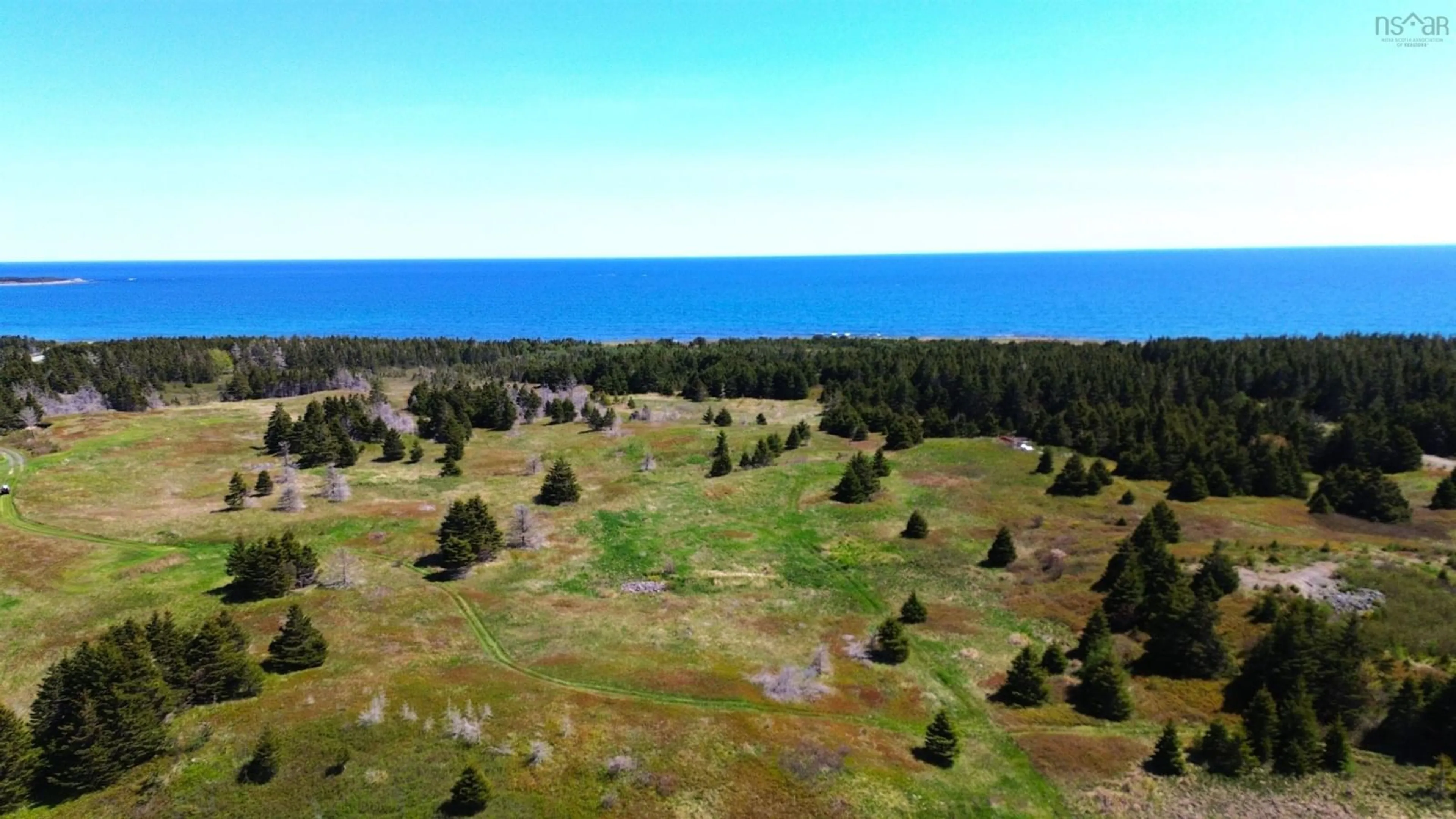 A pic from outside/outdoor area/front of a property/back of a property/a pic from drone, forest/trees view for 3098 Point Michaud Rd, Gracieville Nova Scotia B0E 1W0