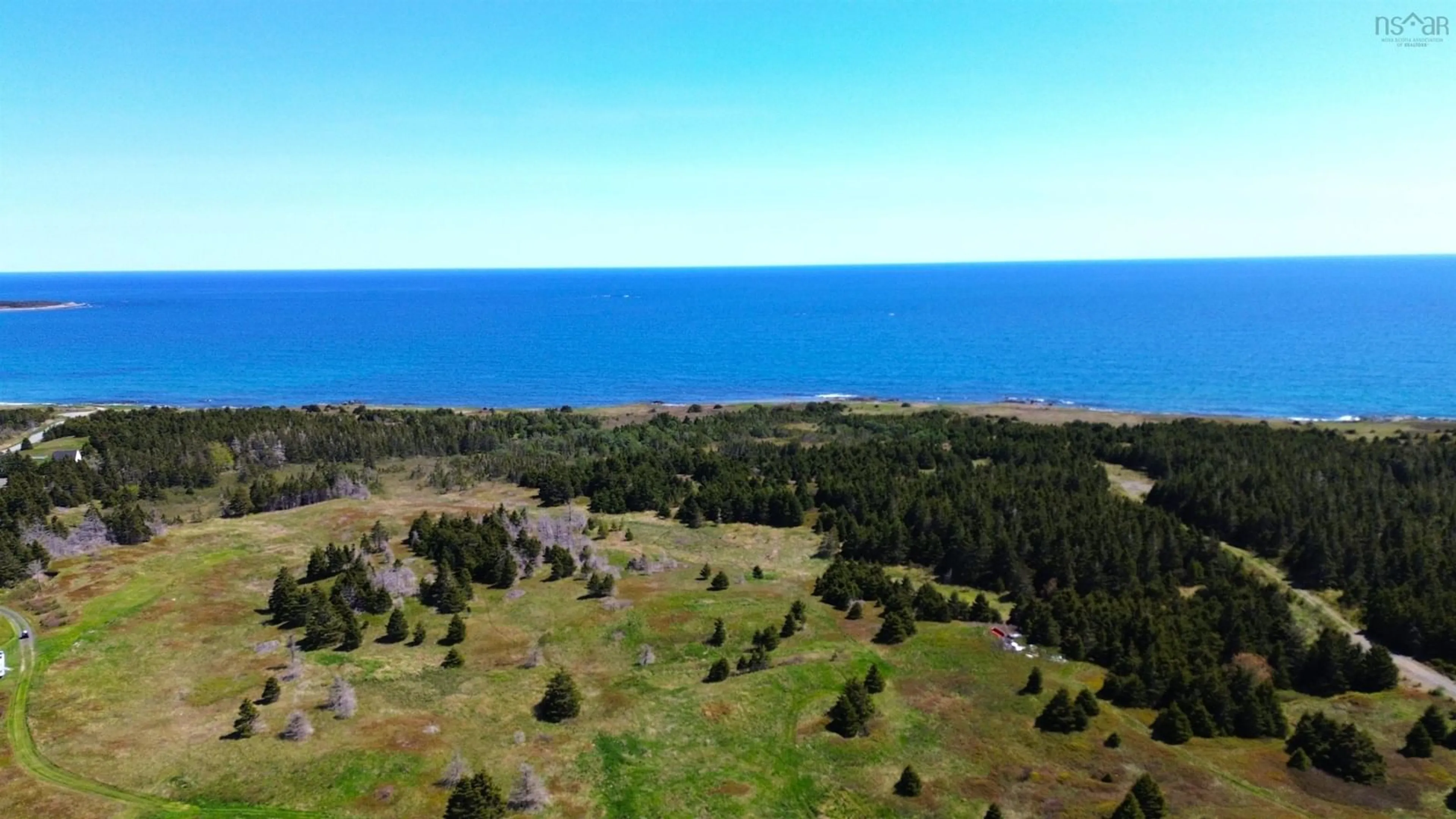 A pic from outside/outdoor area/front of a property/back of a property/a pic from drone, water/lake/river/ocean view for 3098 Point Michaud Rd, Gracieville Nova Scotia B0E 1W0