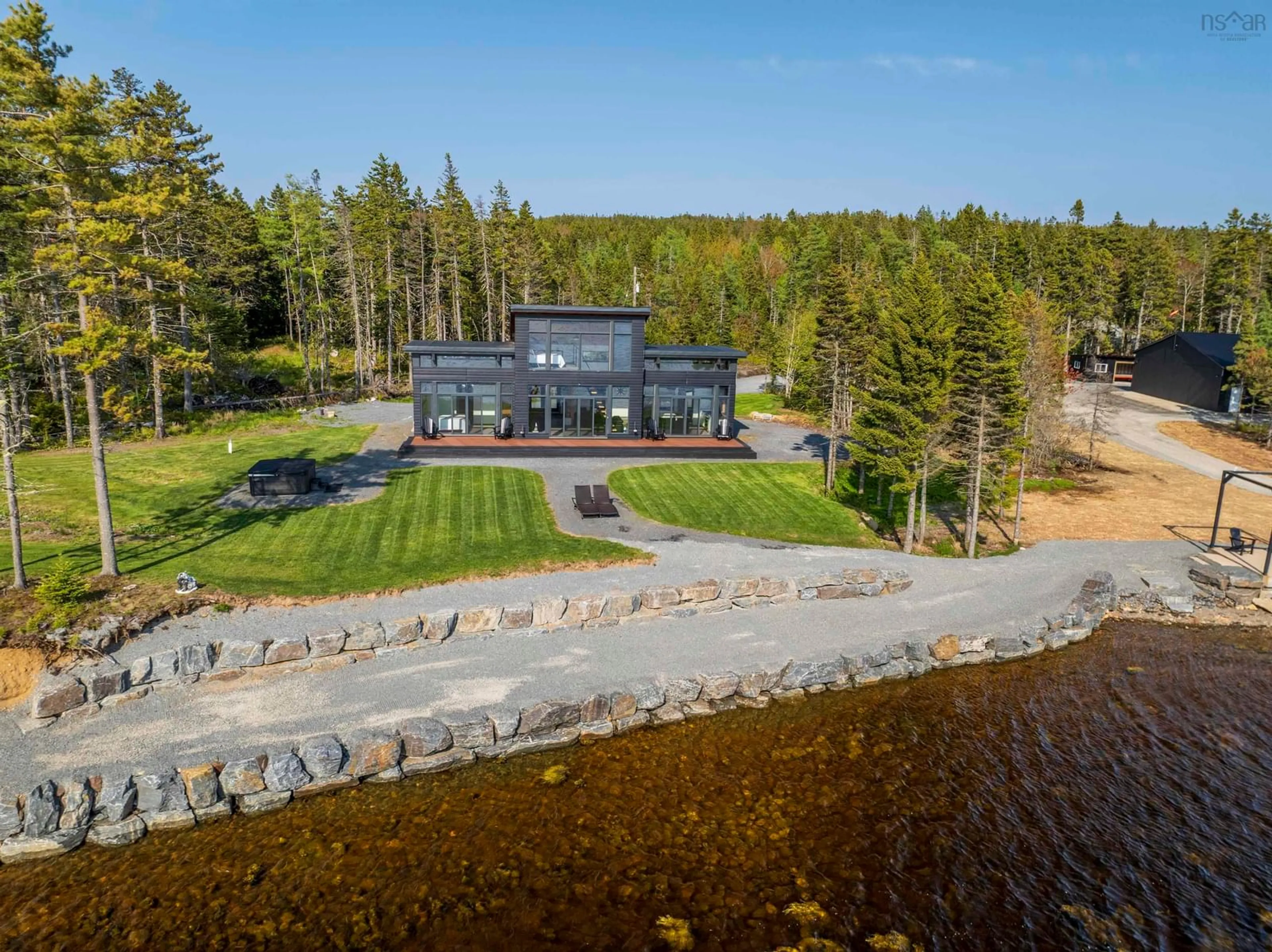 A pic from outside/outdoor area/front of a property/back of a property/a pic from drone, water/lake/river/ocean view for 4125 Highway 332, East Lahave Nova Scotia B4V 0W1