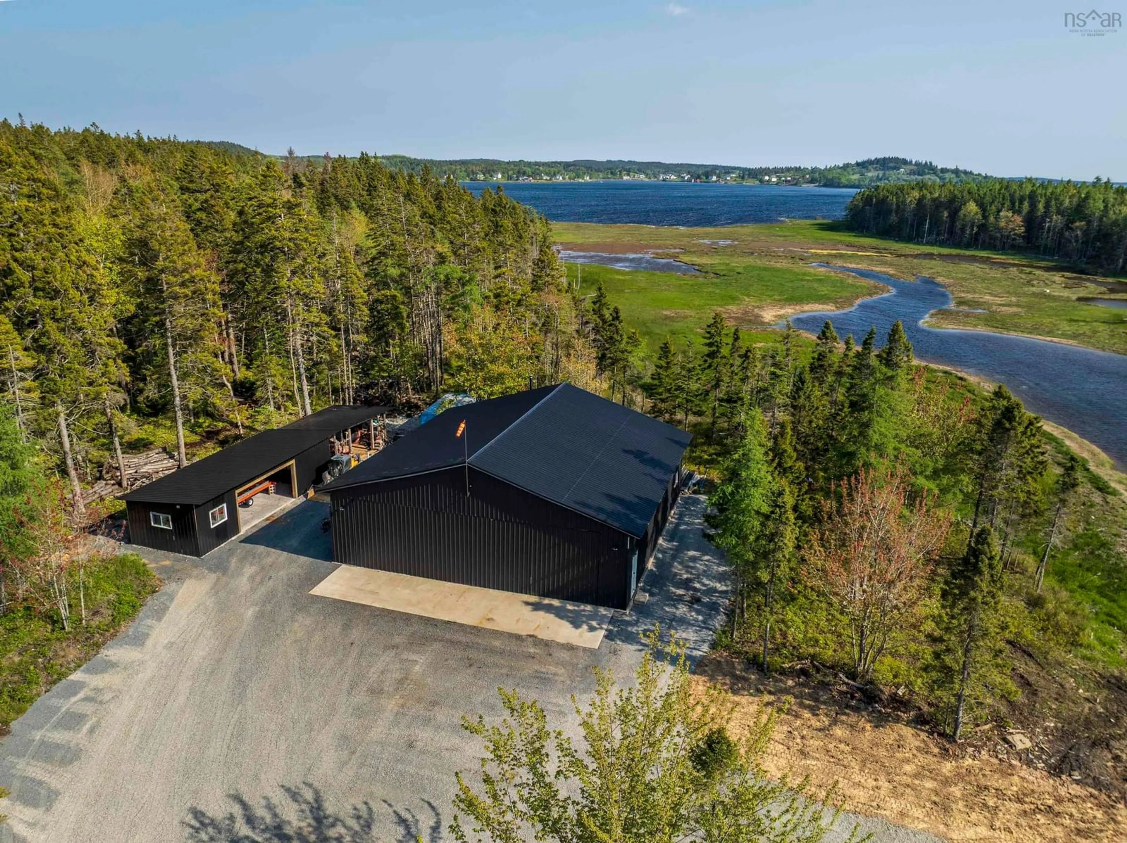 A pic from outside/outdoor area/front of a property/back of a property/a pic from drone, water/lake/river/ocean view for 4125 Highway 332, East Lahave Nova Scotia B4V 0W1
