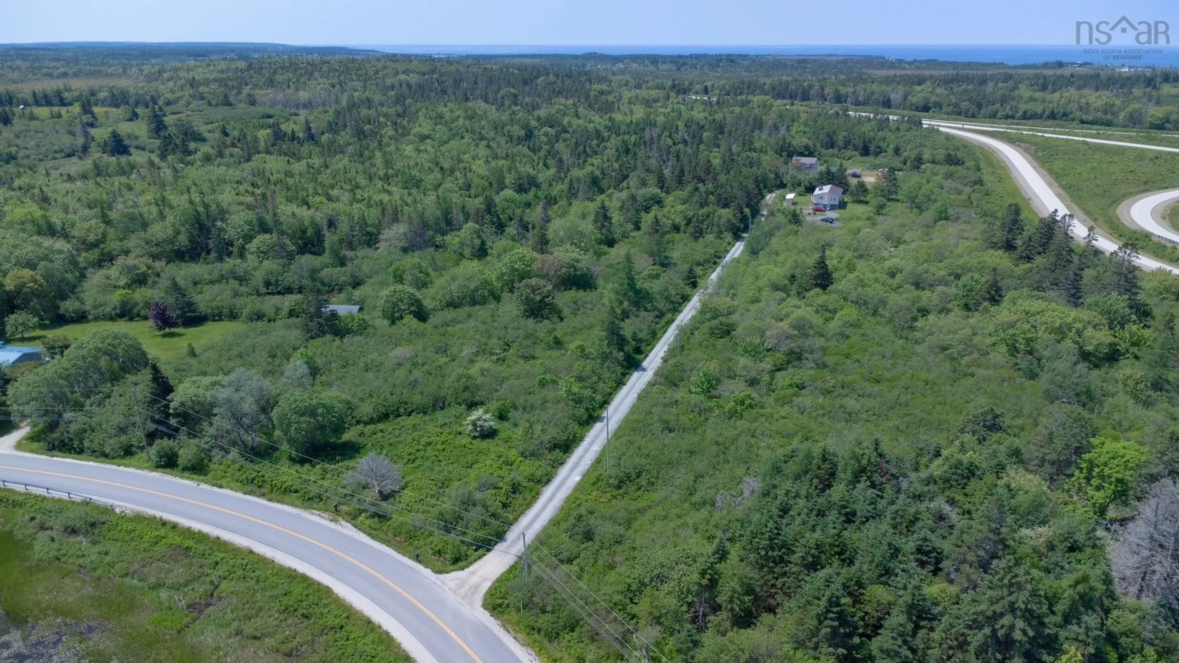 A pic from outside/outdoor area/front of a property/back of a property/a pic from drone, forest/trees view for 62 Lake Doucette Rd, Lake Doucette Nova Scotia B0W 2Y0