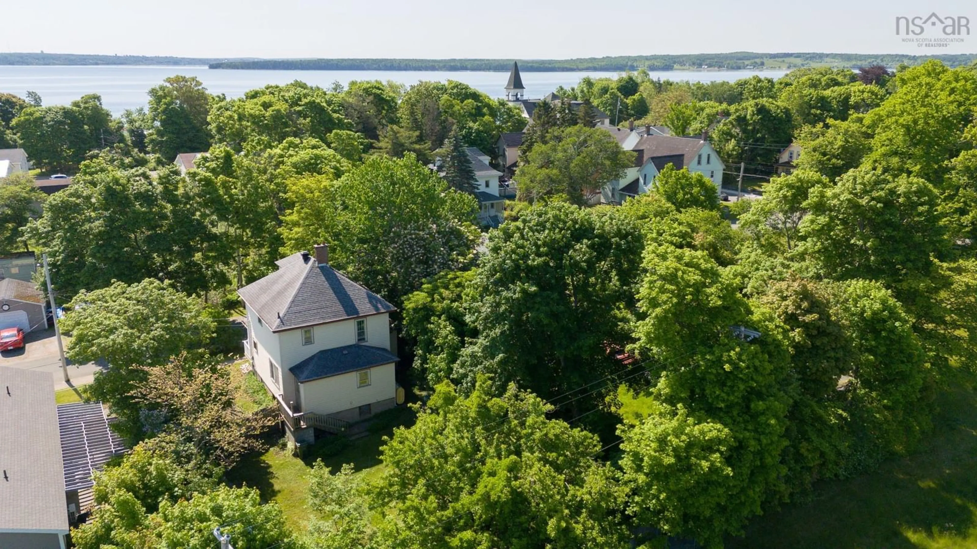A pic from outside/outdoor area/front of a property/back of a property/a pic from drone, water/lake/river/ocean view for 27 Victoria Street, North Sydney Nova Scotia B2A 1G8