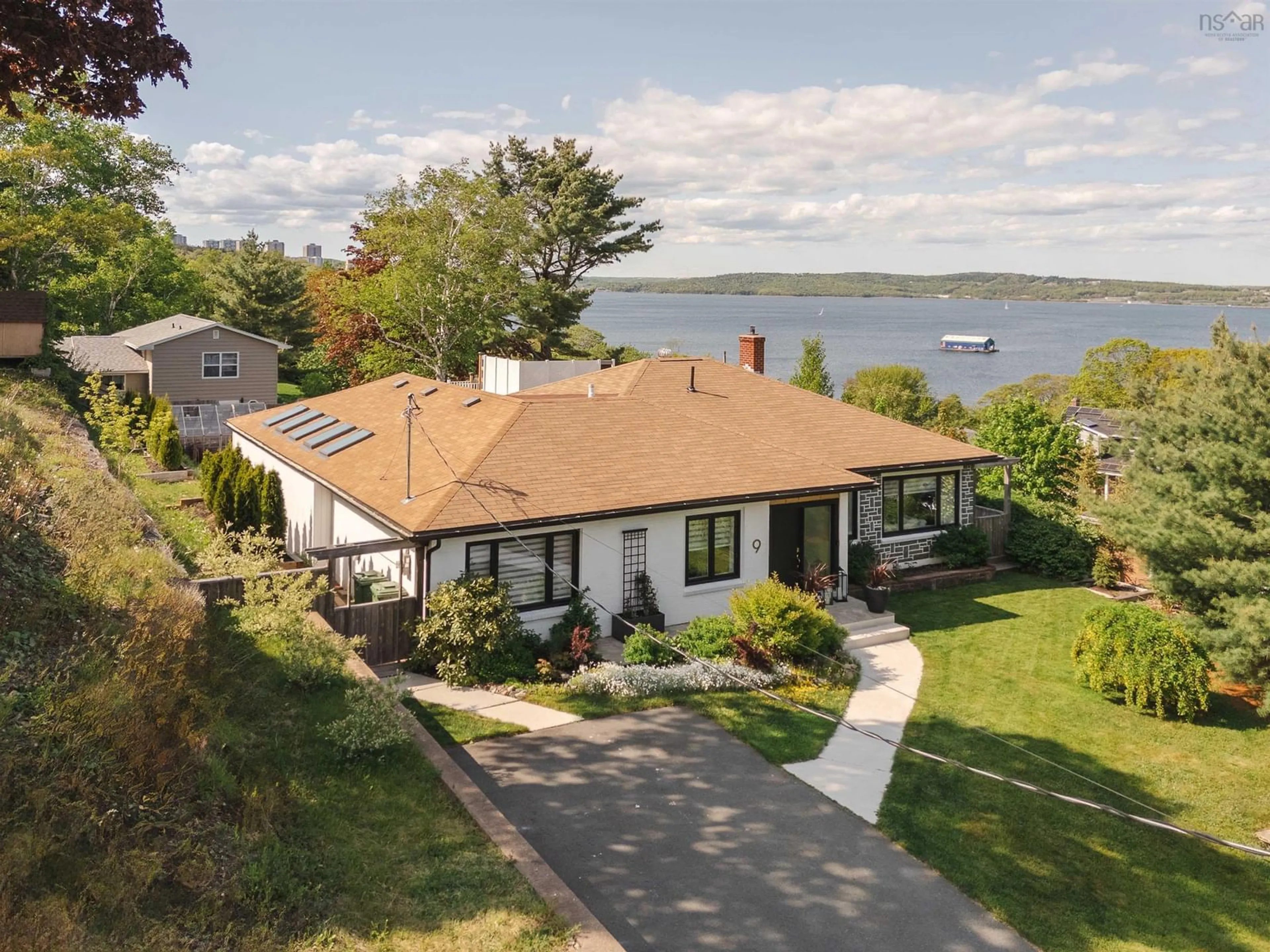 A pic from outside/outdoor area/front of a property/back of a property/a pic from drone, water/lake/river/ocean view for 9 Lynwood Dr, Halifax Nova Scotia B3M 1Y8