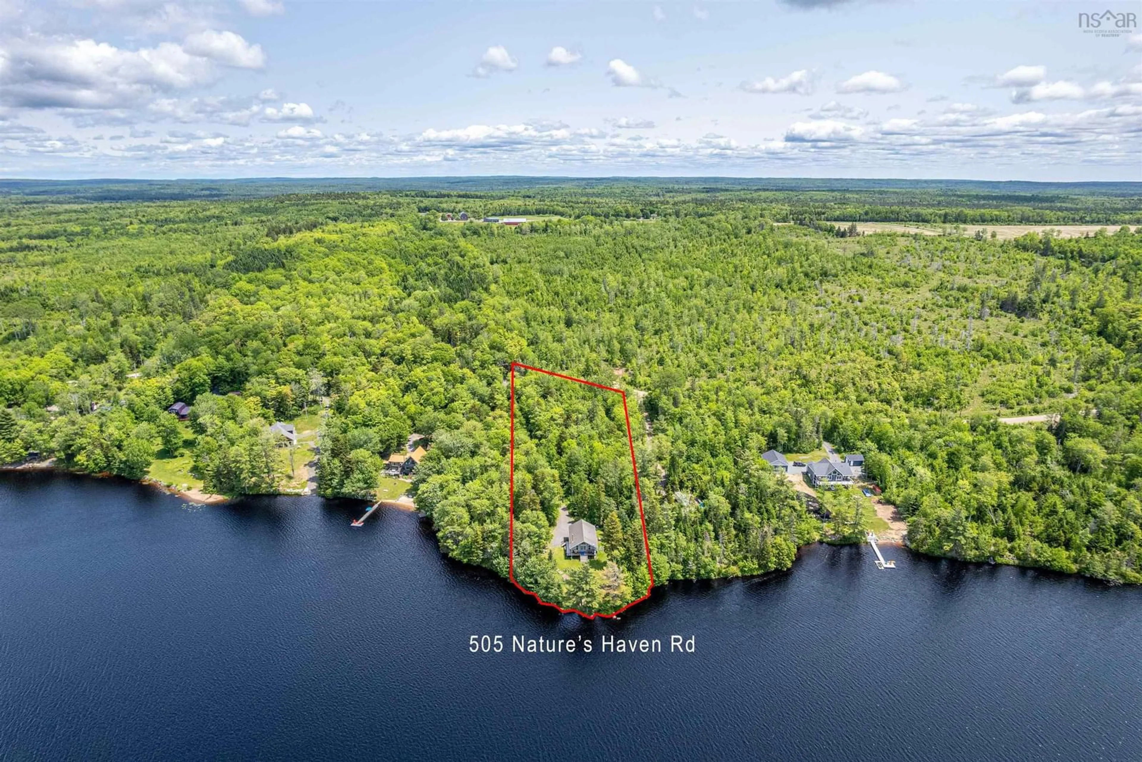 A pic from outside/outdoor area/front of a property/back of a property/a pic from drone, water/lake/river/ocean view for 505 Natures Haven Rd, Lake Paul Nova Scotia B0P 1C0
