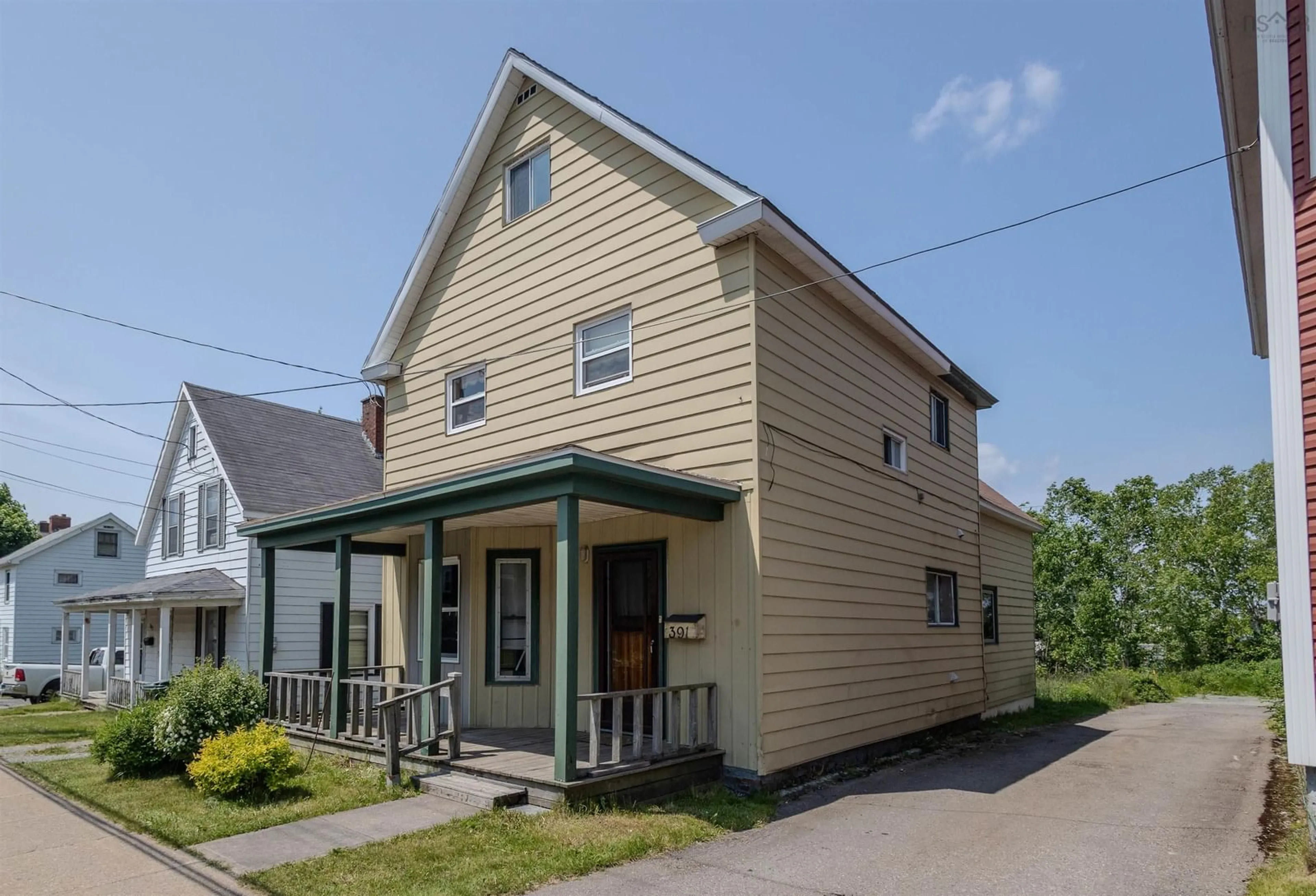 Home with vinyl exterior material, street for 391 Townsend St, Sydney Nova Scotia B1P 5G3