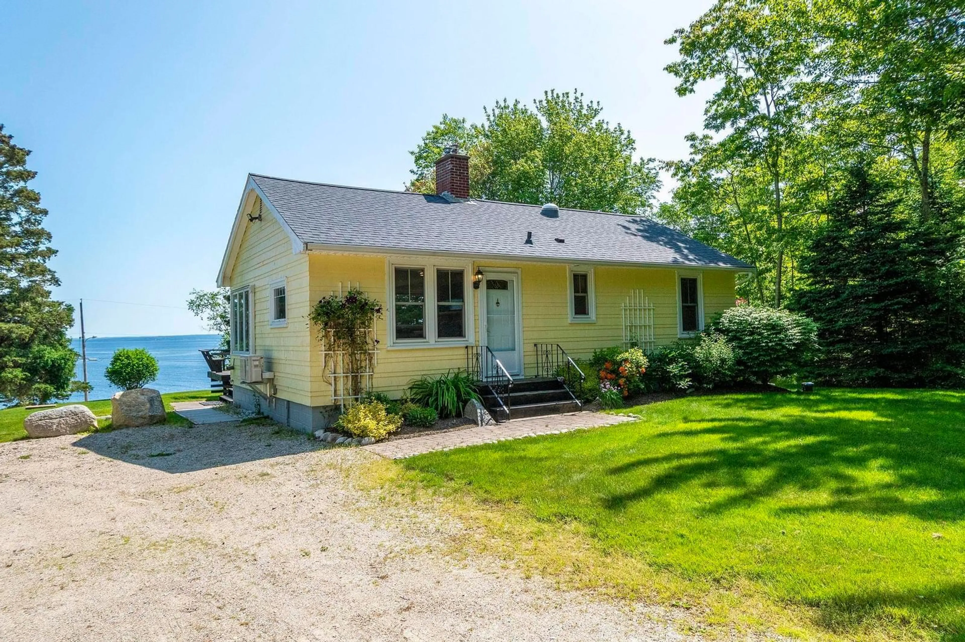A pic from outside/outdoor area/front of a property/back of a property/a pic from drone, water/lake/river/ocean view for 1435 Highway 329, Mill Cove Nova Scotia B0J 1T0