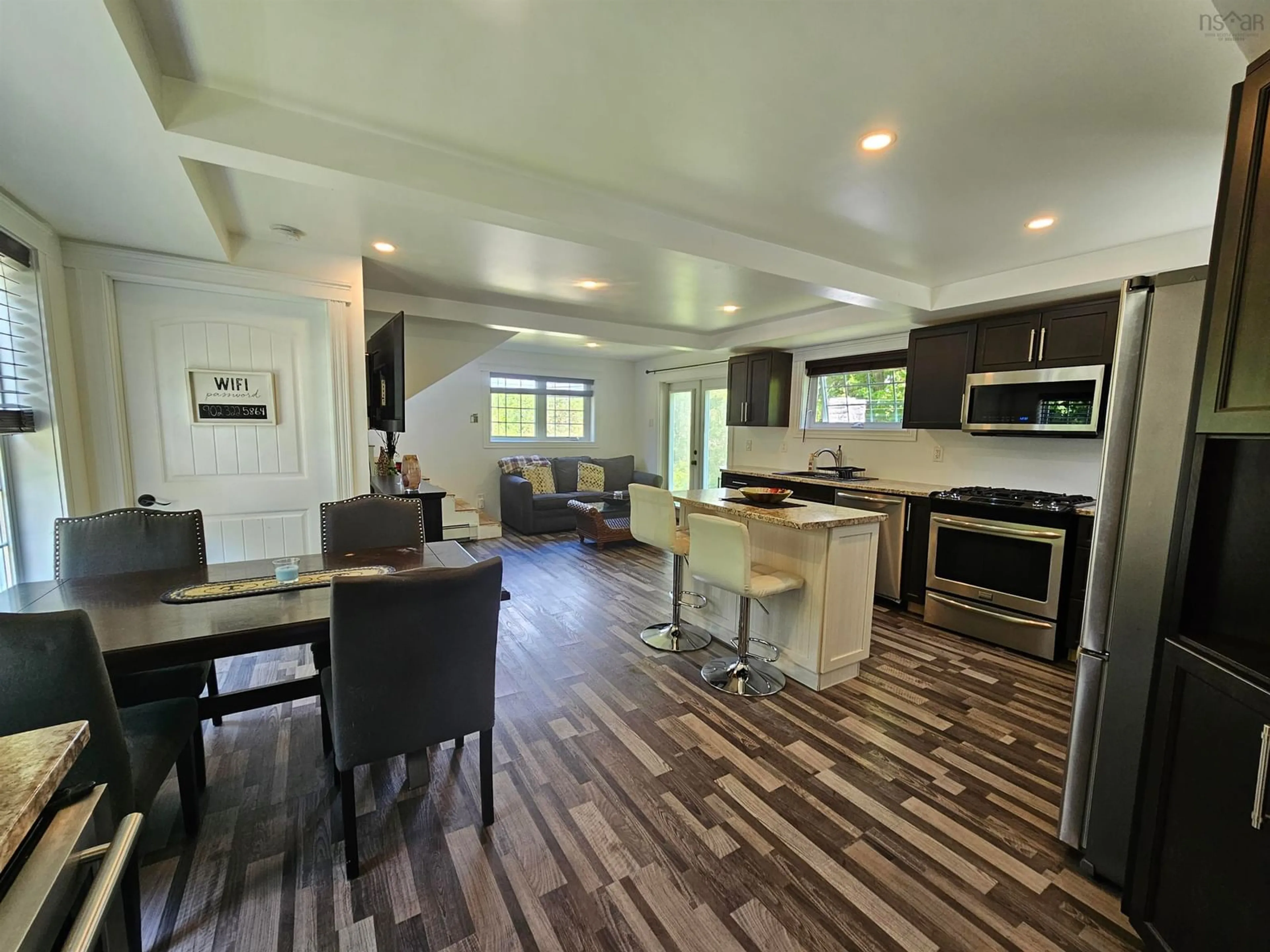 Open concept kitchen, wood/laminate floor for 1349 Georges River Rd, Georges River Nova Scotia B1Y 3J7