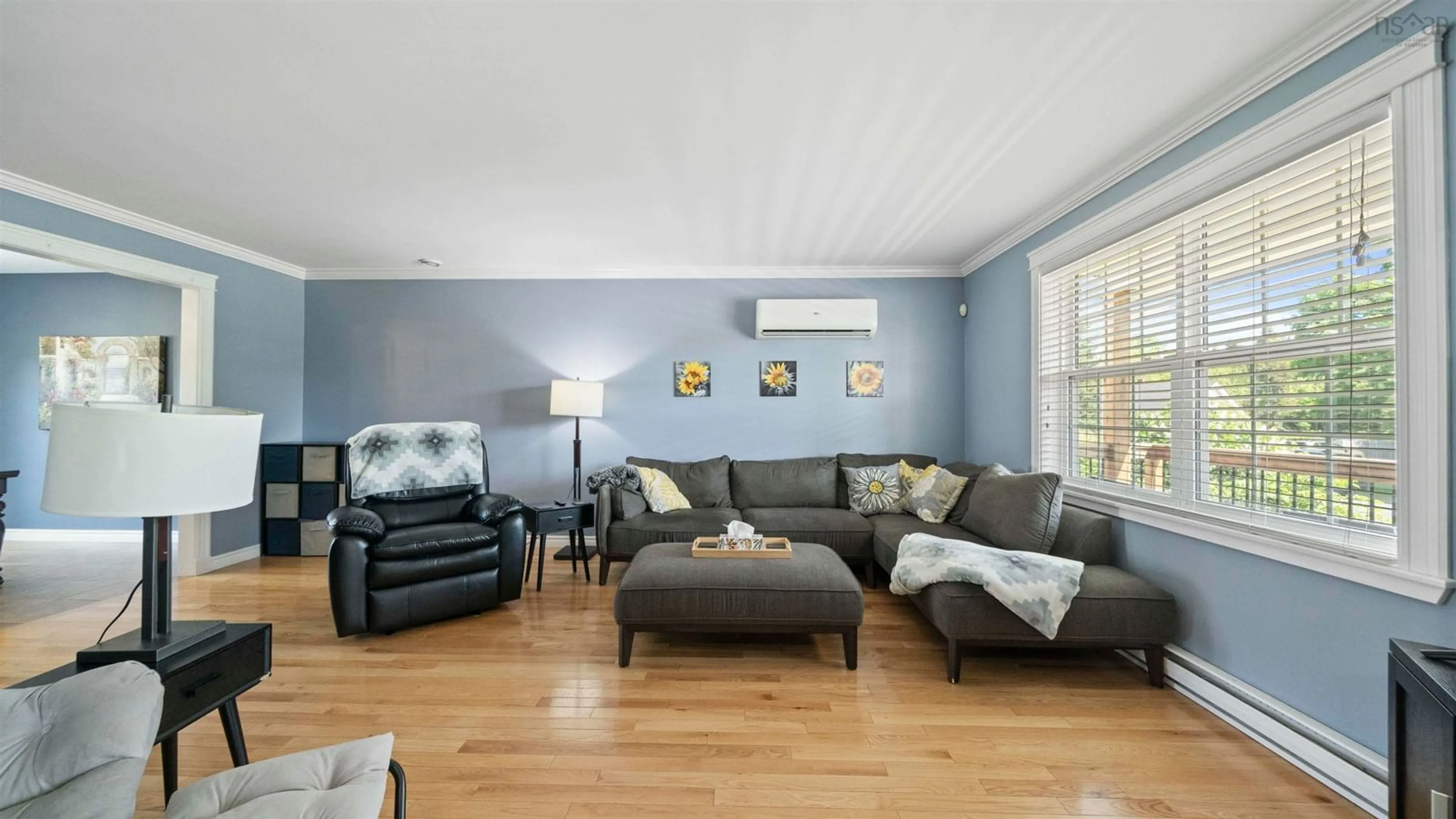 Living room with furniture, wood/laminate floor for 30 Trinity Way, Timberlea Nova Scotia B3T 1B8