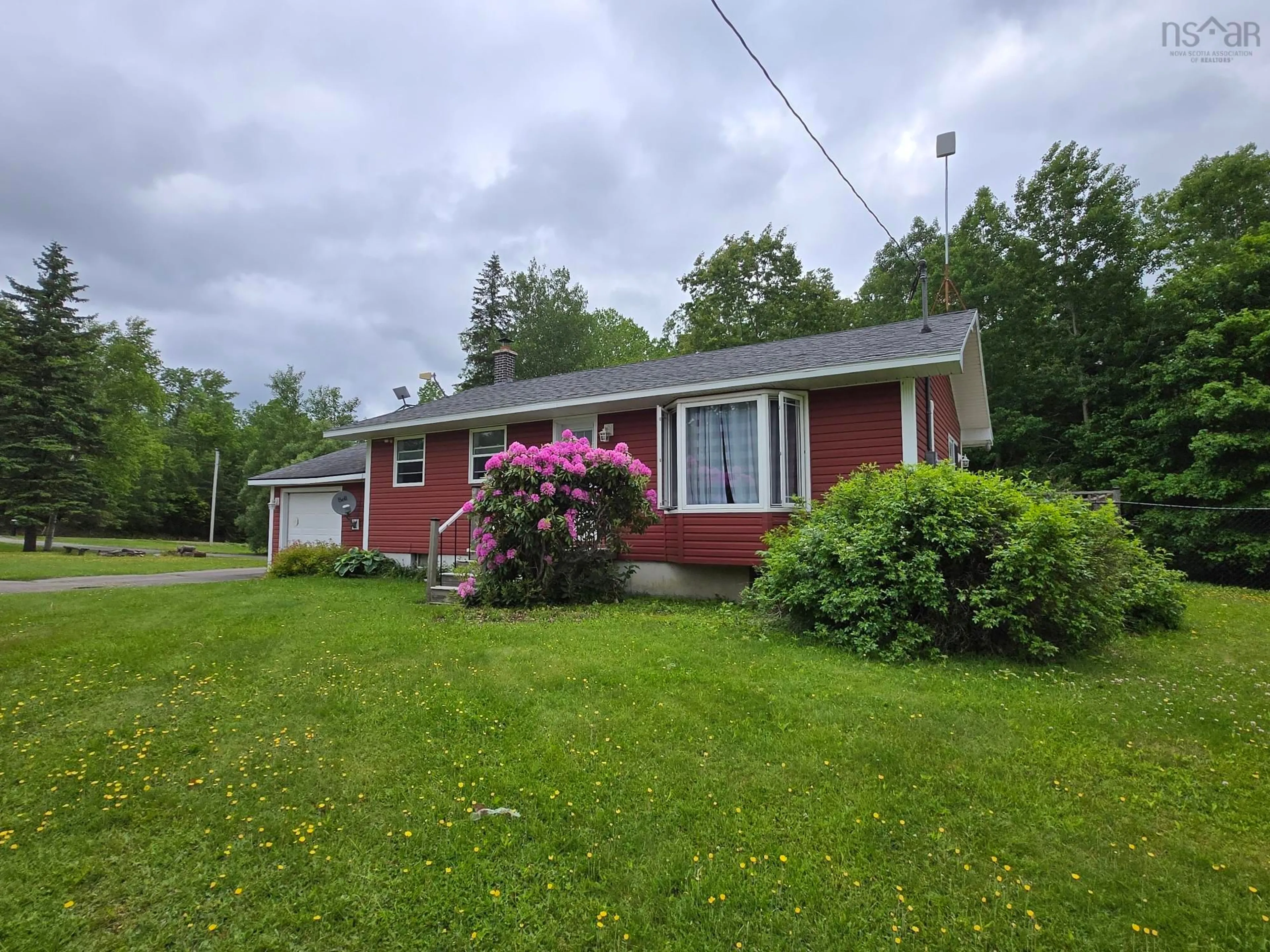 A pic from outside/outdoor area/front of a property/back of a property/a pic from drone, street for 8500 Sherbrooke Rd, Mcphersons Mills Nova Scotia B0K 1W0
