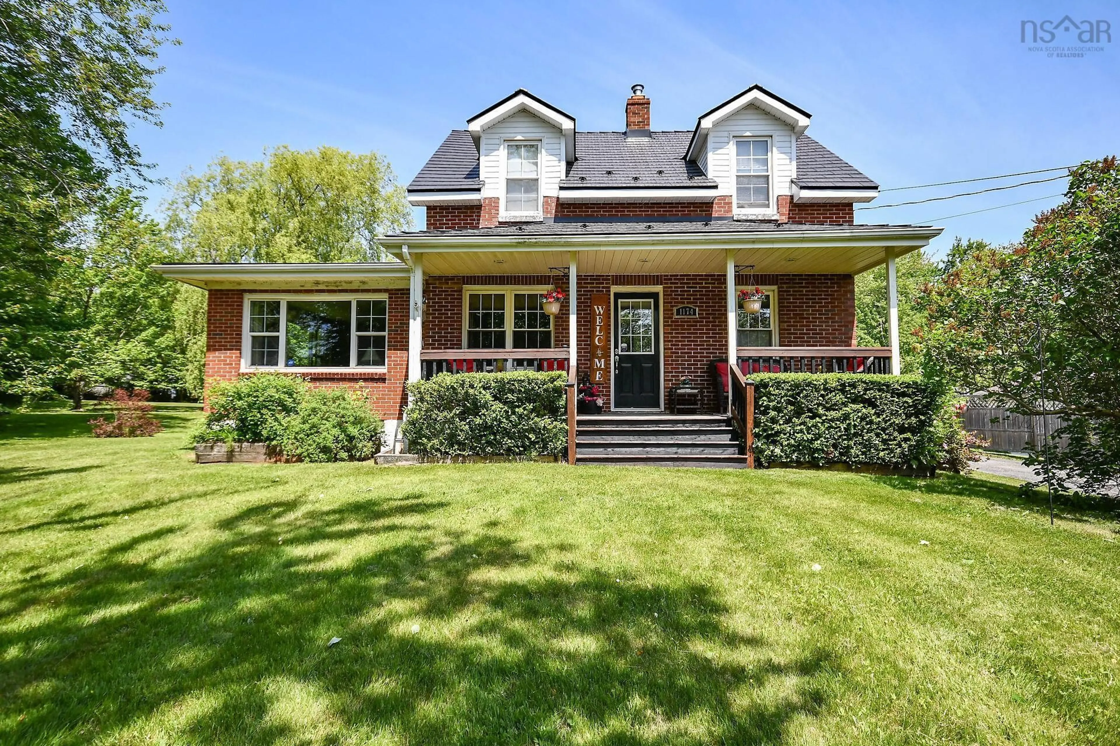 Home with brick exterior material, street for 1174 Highway #2, Lantz Nova Scotia B2S 1T4