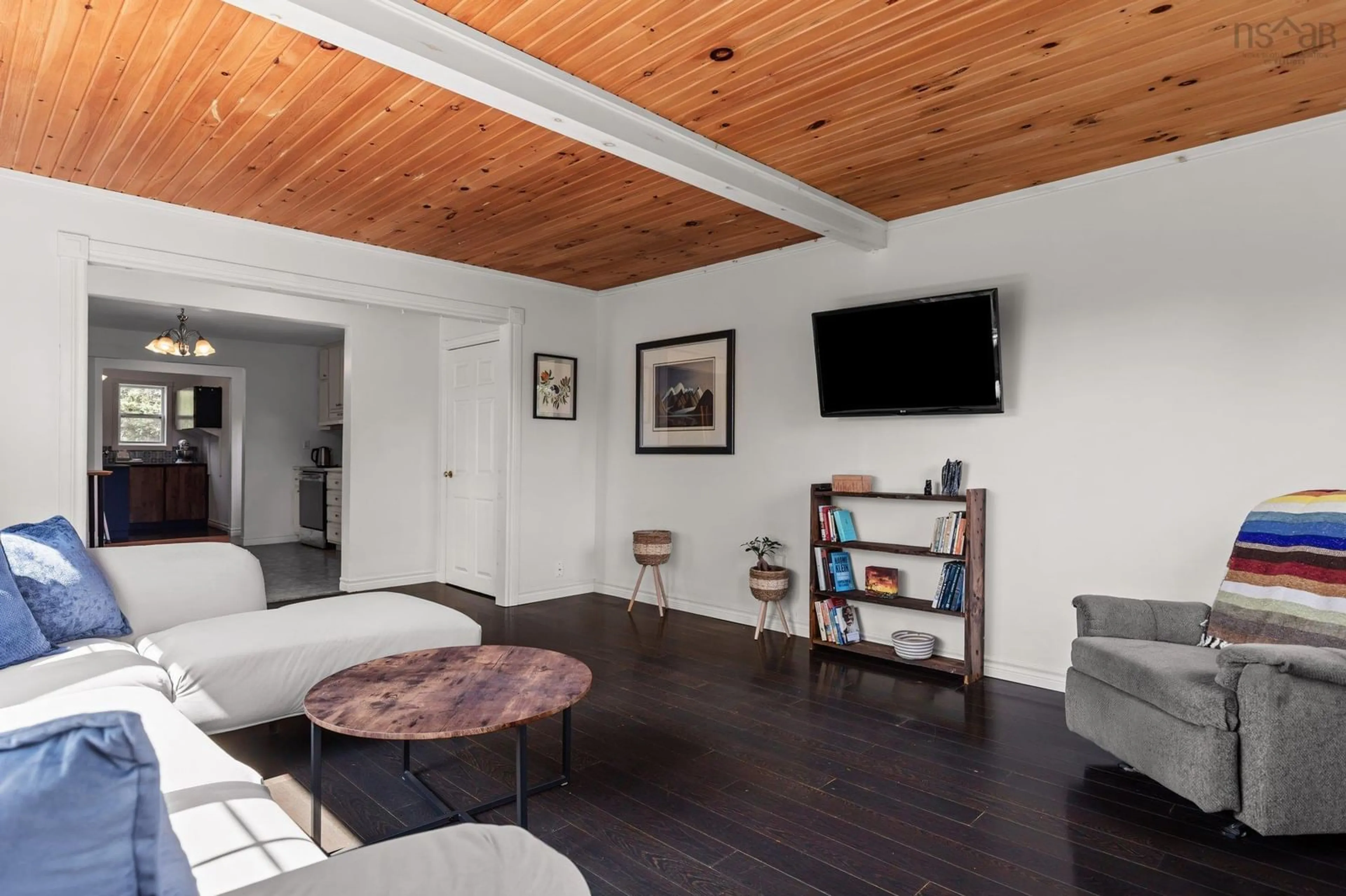Living room with furniture, wood/laminate floor for 60 Petit Lac Rd, West Chezzetcook Nova Scotia B0J 2L0