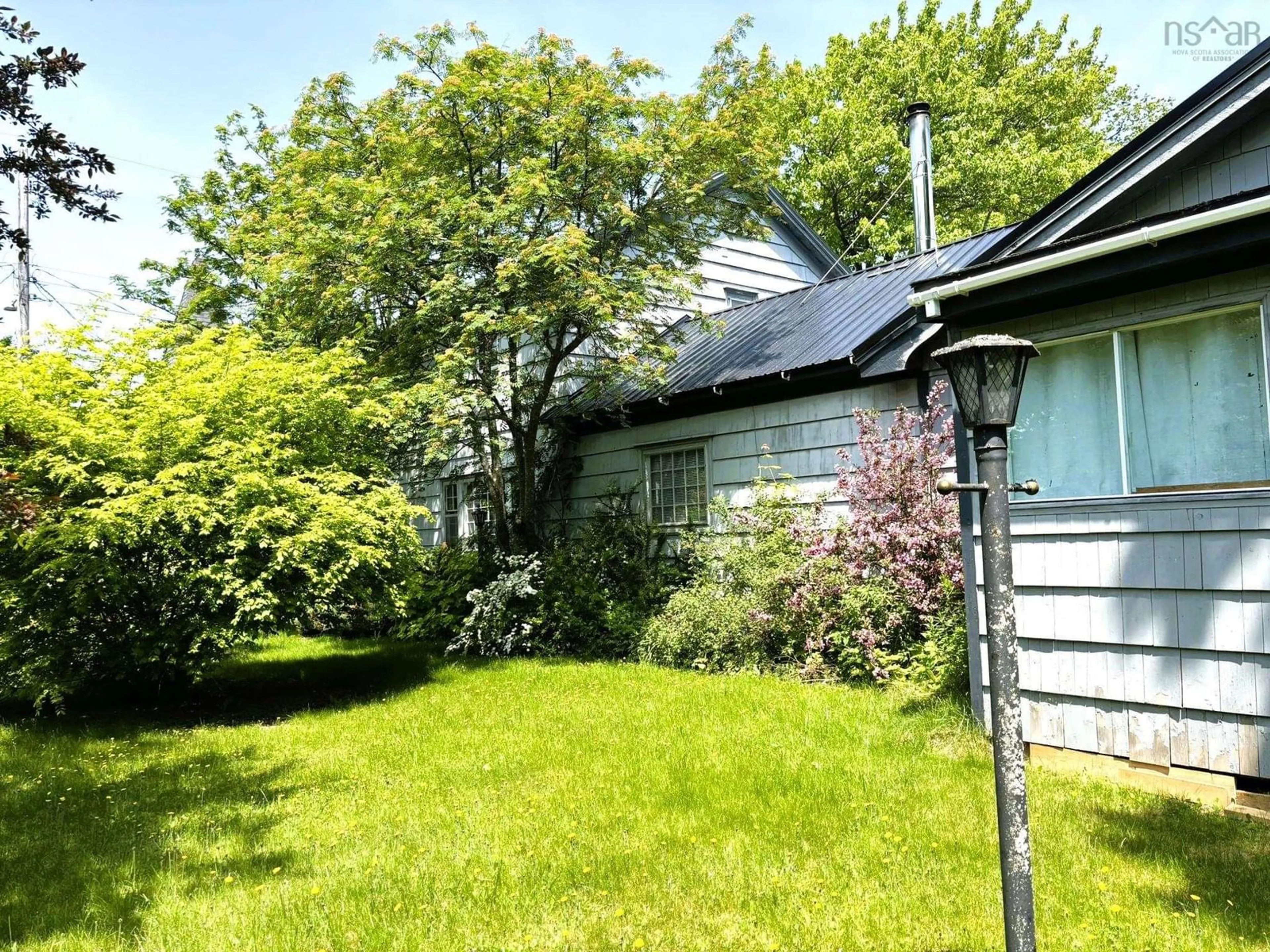 A pic from outside/outdoor area/front of a property/back of a property/a pic from drone, street for 44 Church St, Parrsboro Nova Scotia B0M 1S0