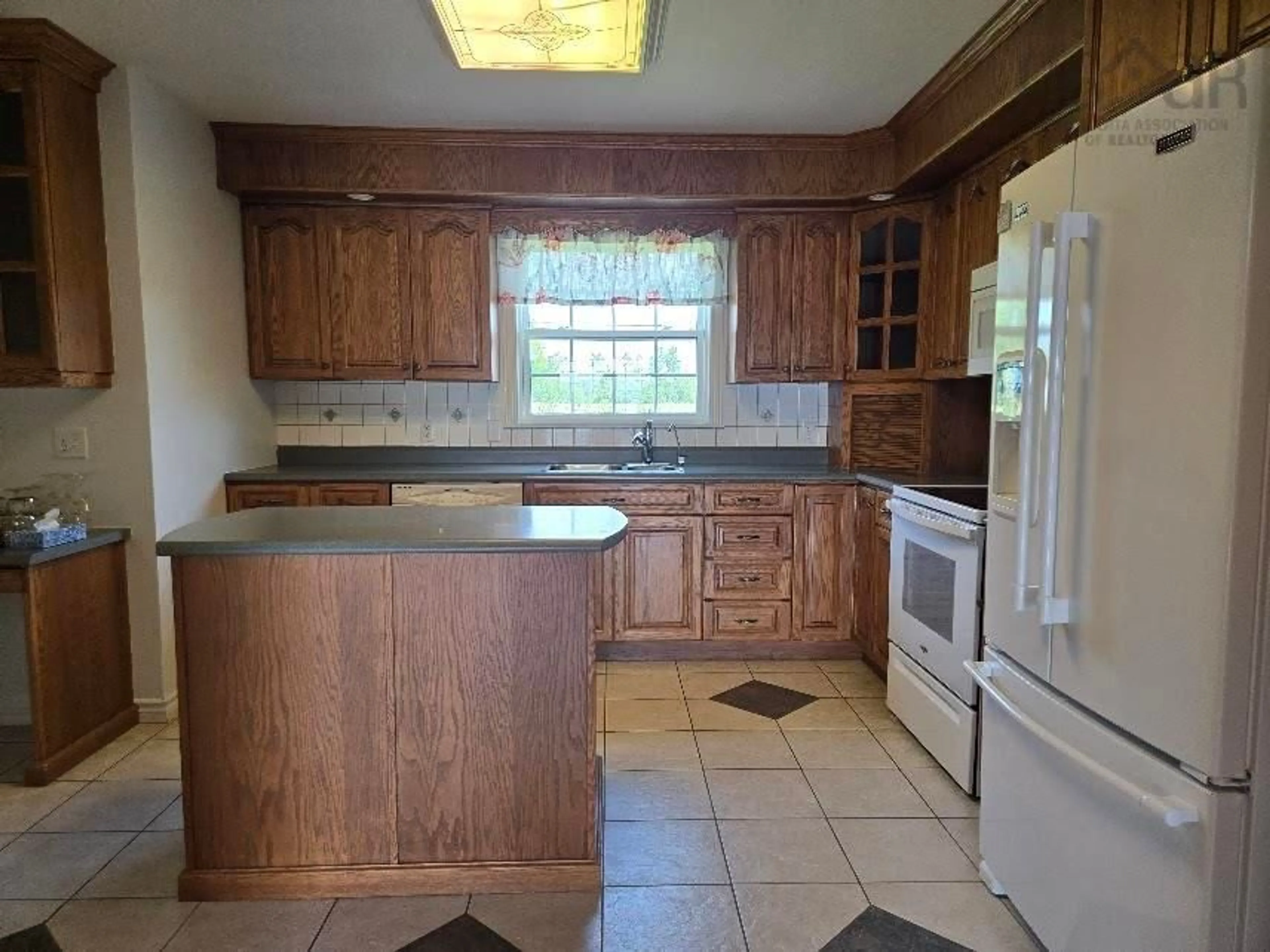 Standard kitchen, ceramic/tile floor for 3158 Malagash Rd, Malagash Centre Nova Scotia B0K 1E0