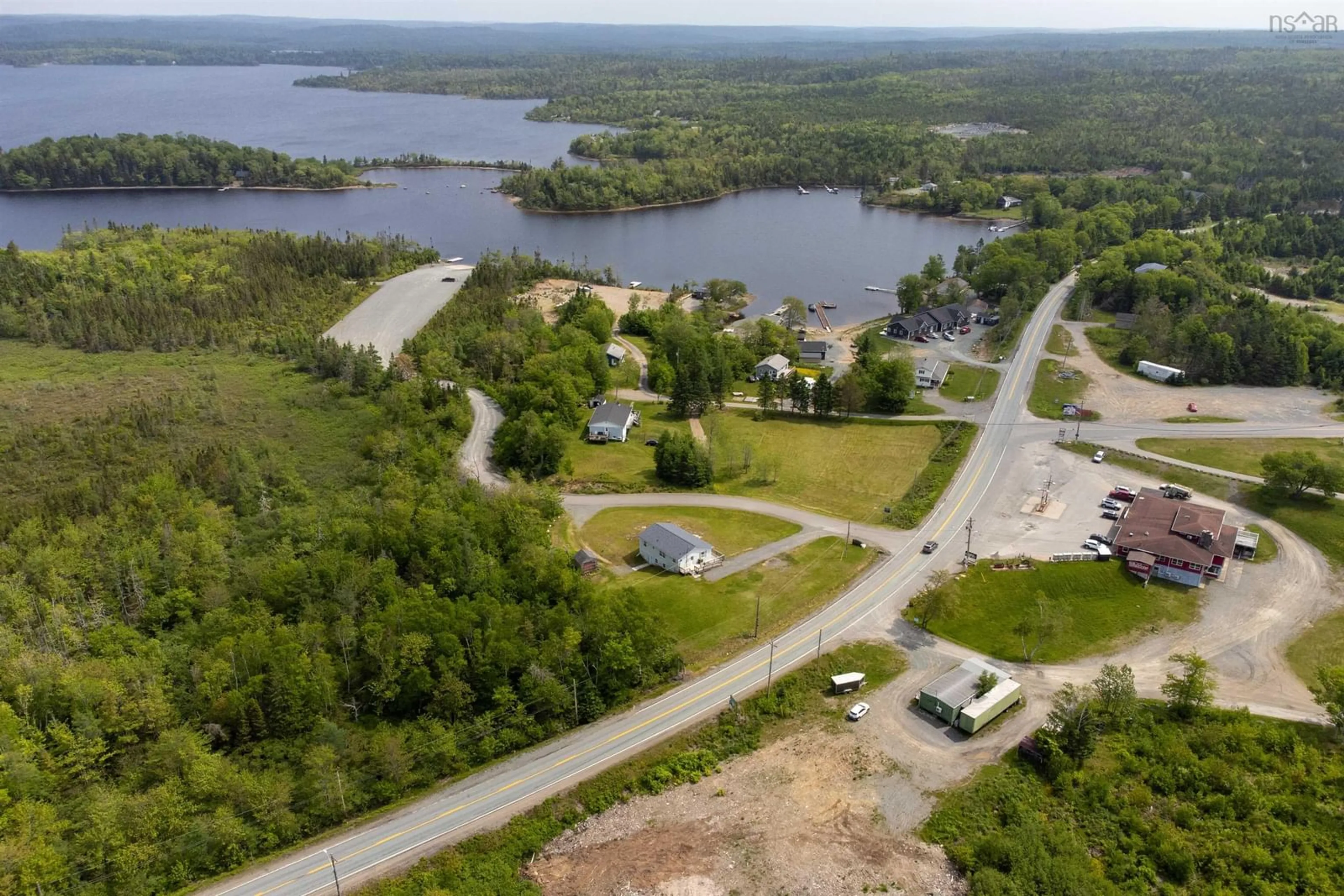 A pic from outside/outdoor area/front of a property/back of a property/a pic from drone, water/lake/river/ocean view for 11459 Highway 7 Hwy, Lake Charlotte Nova Scotia B0J 2L0