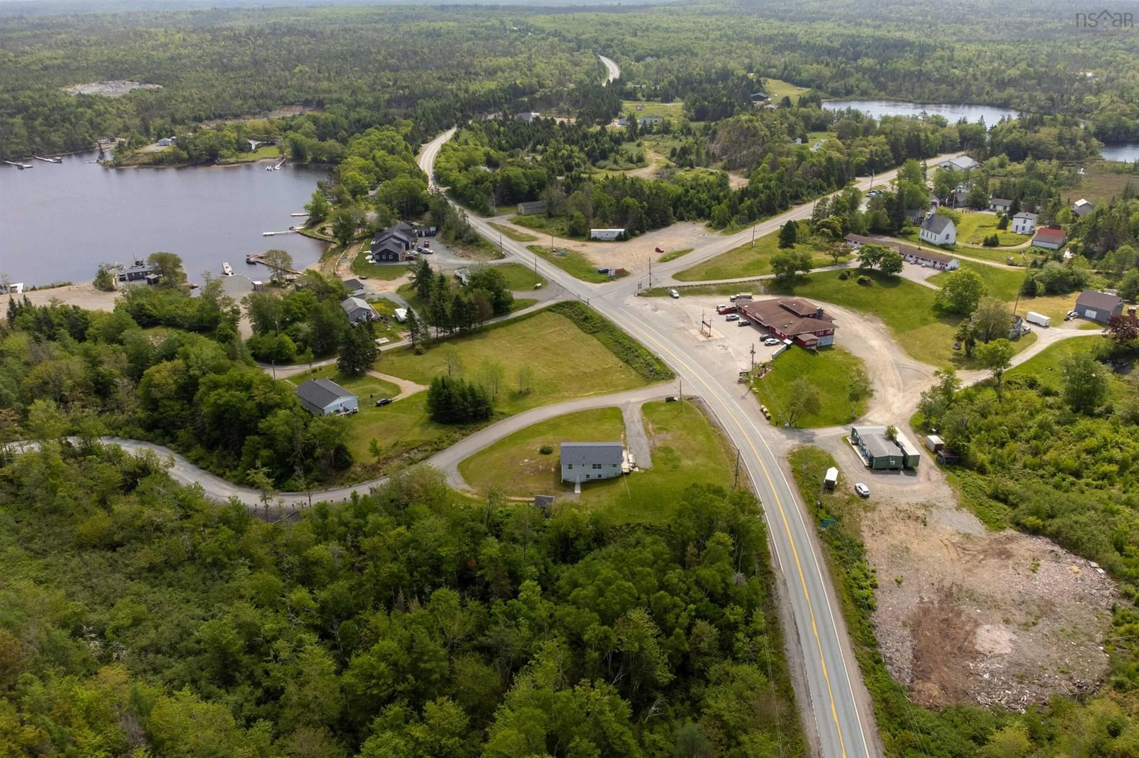 A pic from outside/outdoor area/front of a property/back of a property/a pic from drone, water/lake/river/ocean view for 11459 Highway 7 Hwy, Lake Charlotte Nova Scotia B0J 2L0