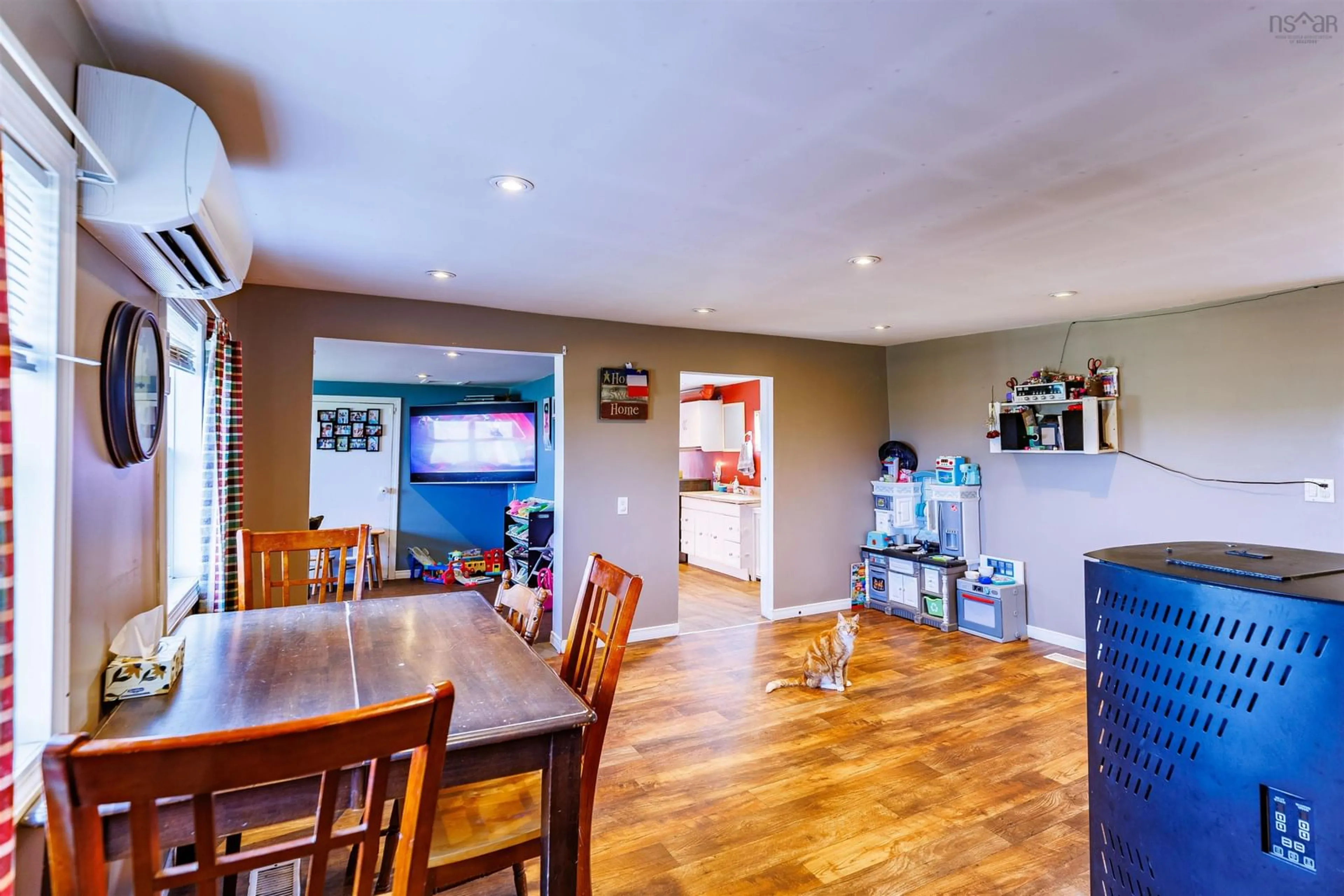 Open concept kitchen, wood/laminate floor for 5898 Highway 1, Mavillette Nova Scotia B5A 5B3