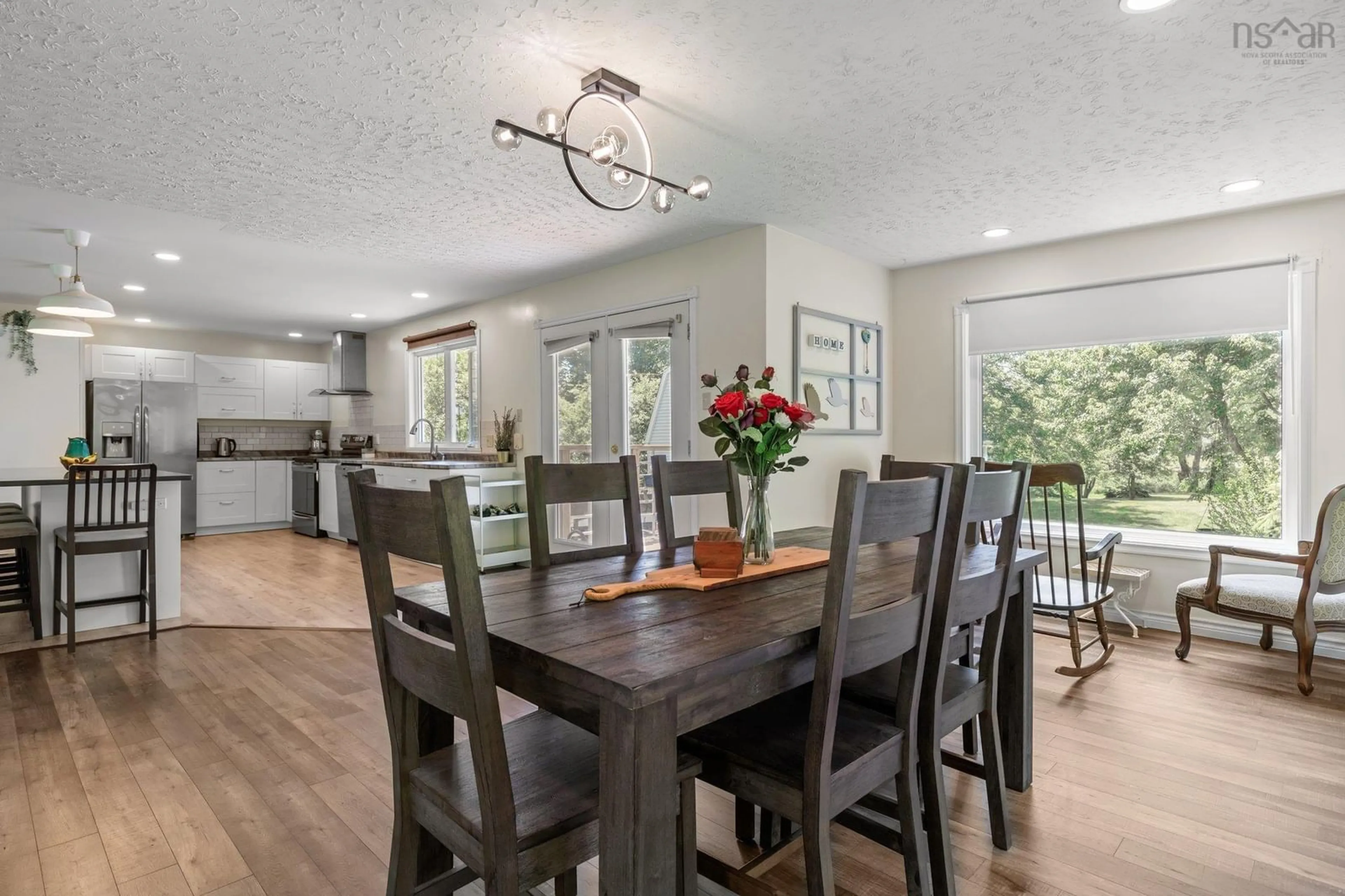 Open concept kitchen, wood/laminate floor for 60 Fletcher Dr, Fall River Nova Scotia B2T 1J2