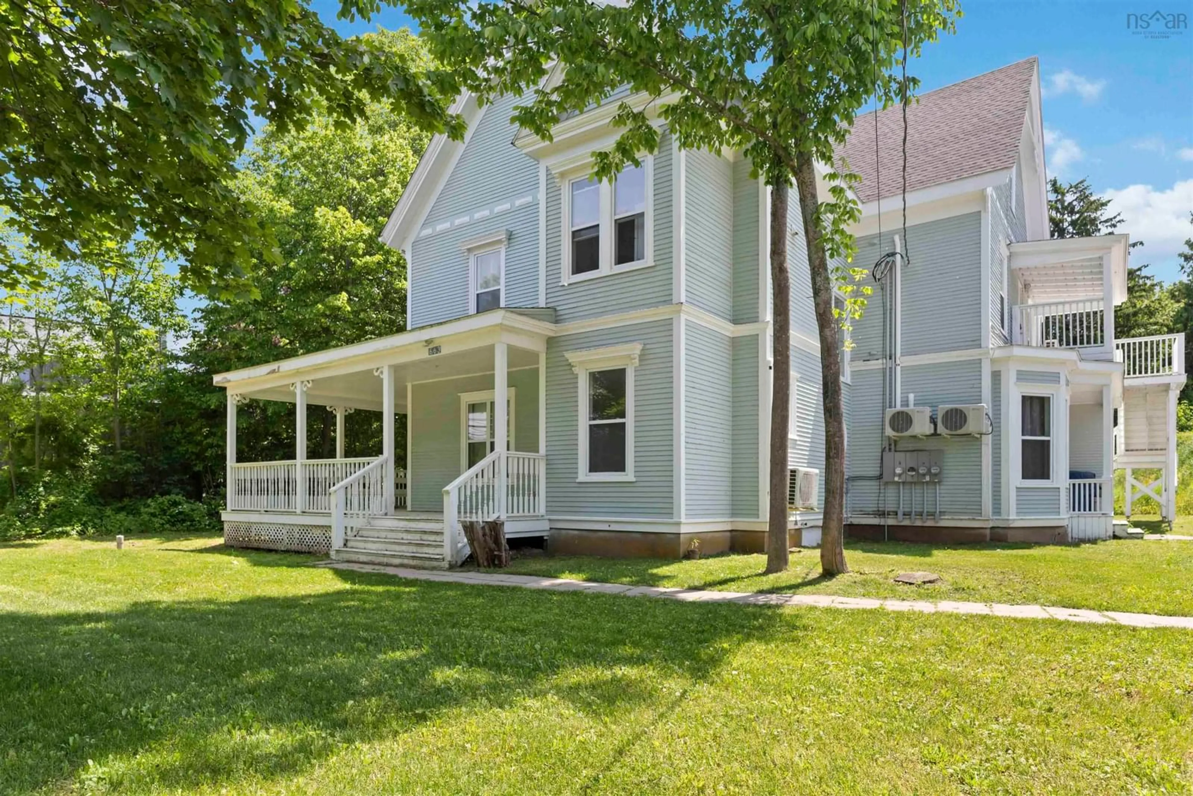 Home with vinyl exterior material, street for 663 Main St, Wolfville Nova Scotia B4P 1G3