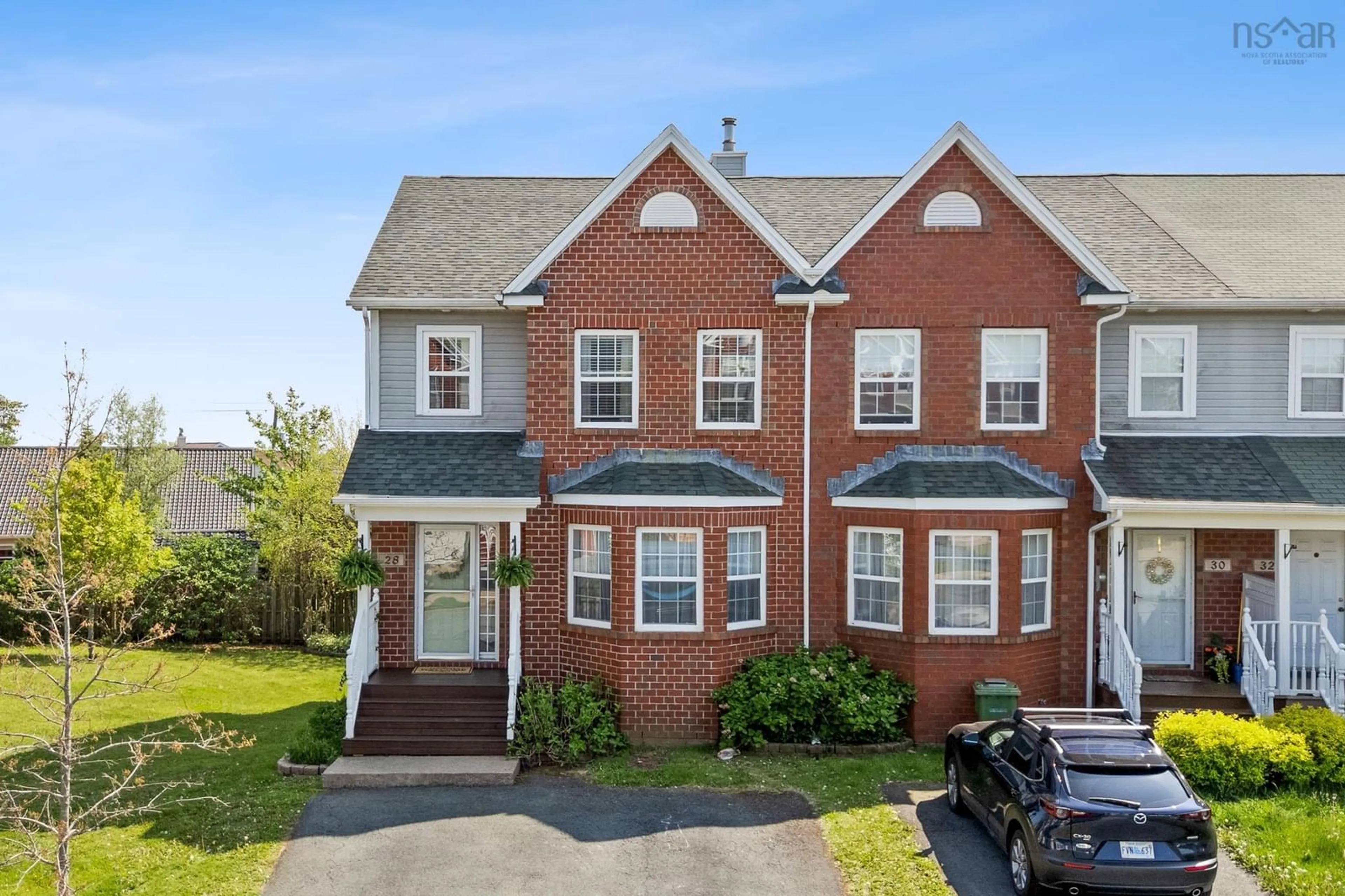 Home with brick exterior material, street for 28 Woodhaven Close, Dartmouth Nova Scotia B2W 6P9