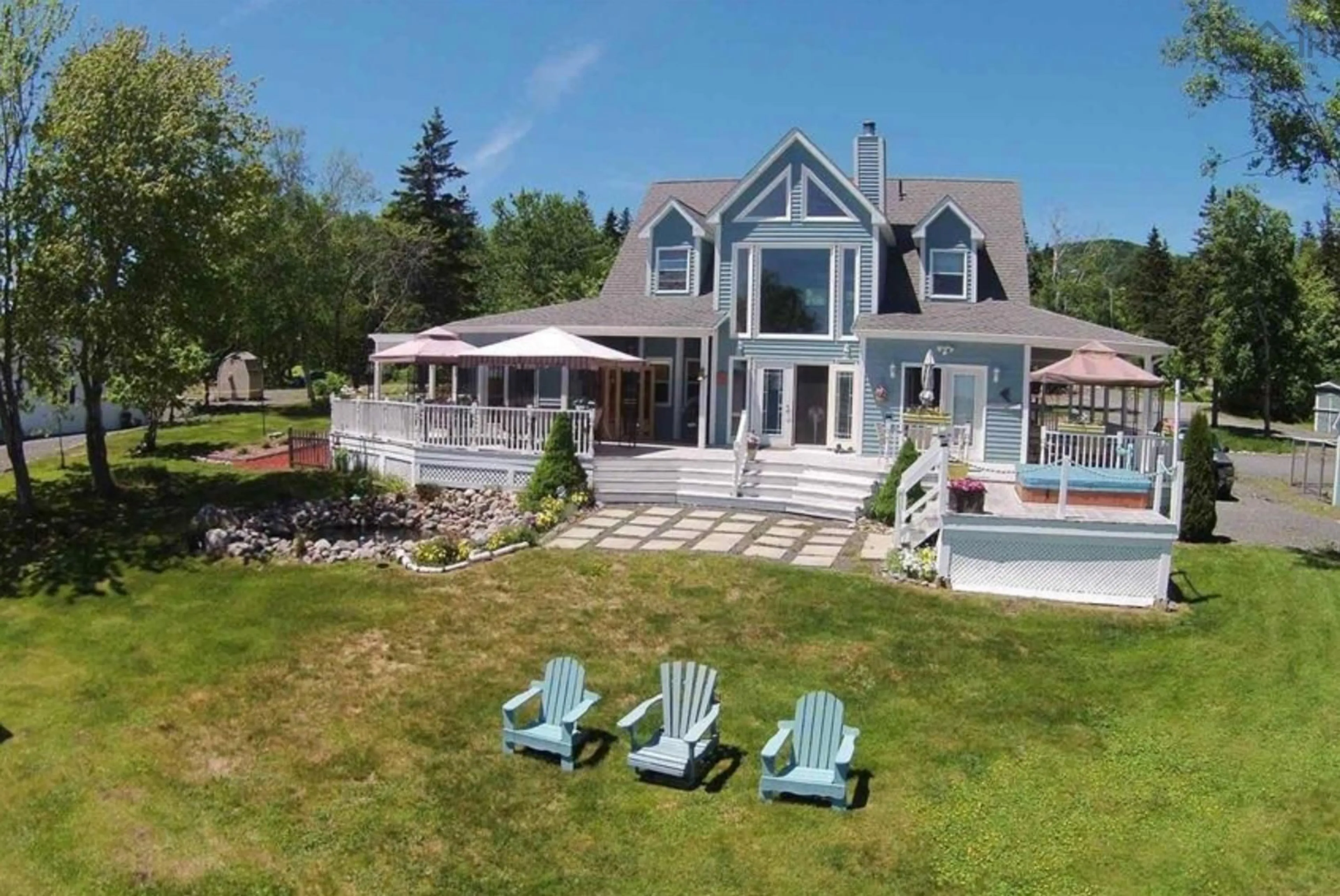 A pic from outside/outdoor area/front of a property/back of a property/a pic from drone, water/lake/river/ocean view for 45227 Cabot Trail Hwy, North Shore Nova Scotia B0C 1H0