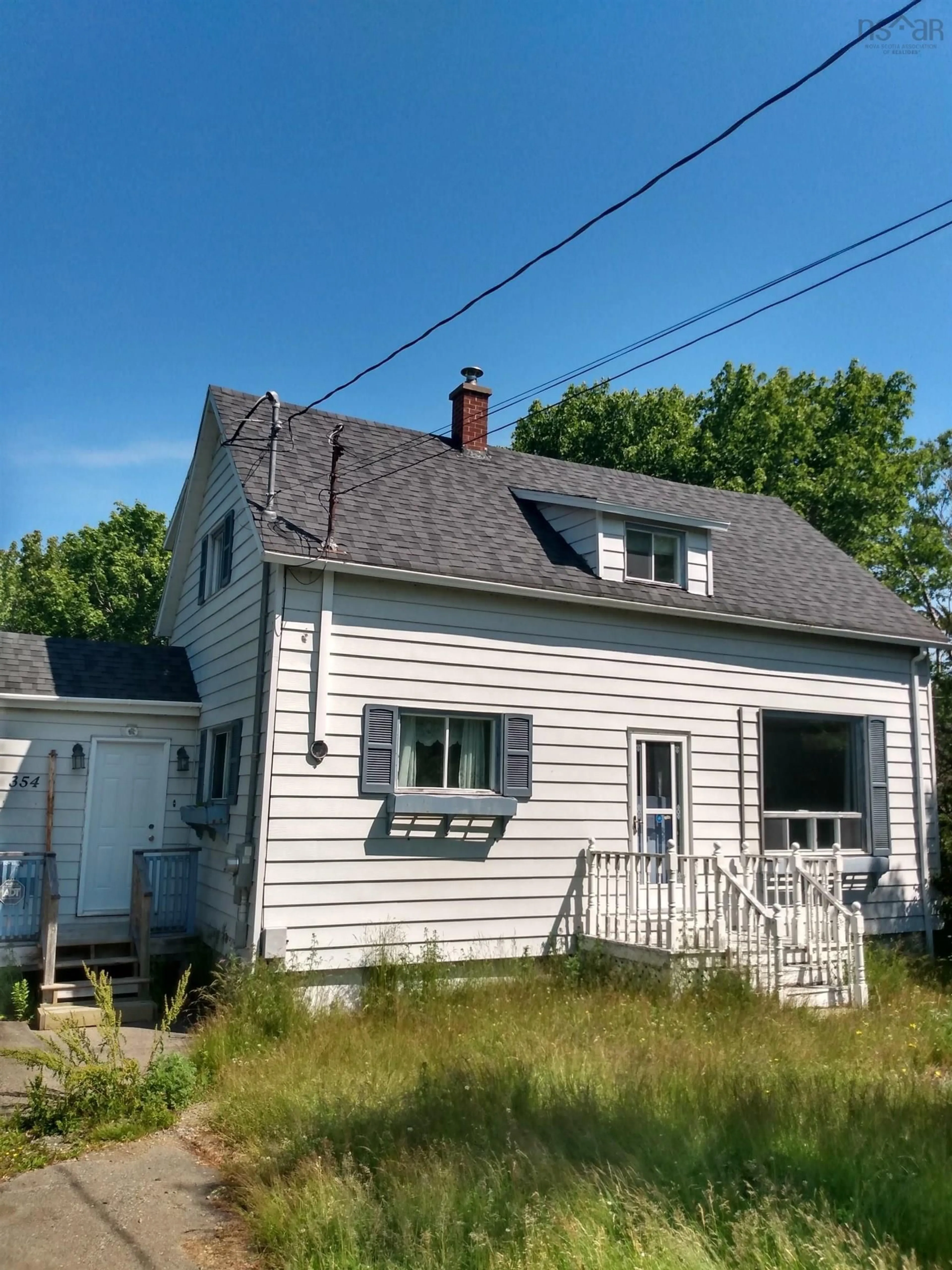 Home with vinyl exterior material, street for 354 Donkin Hwy, Donkin Nova Scotia B1A 6W6