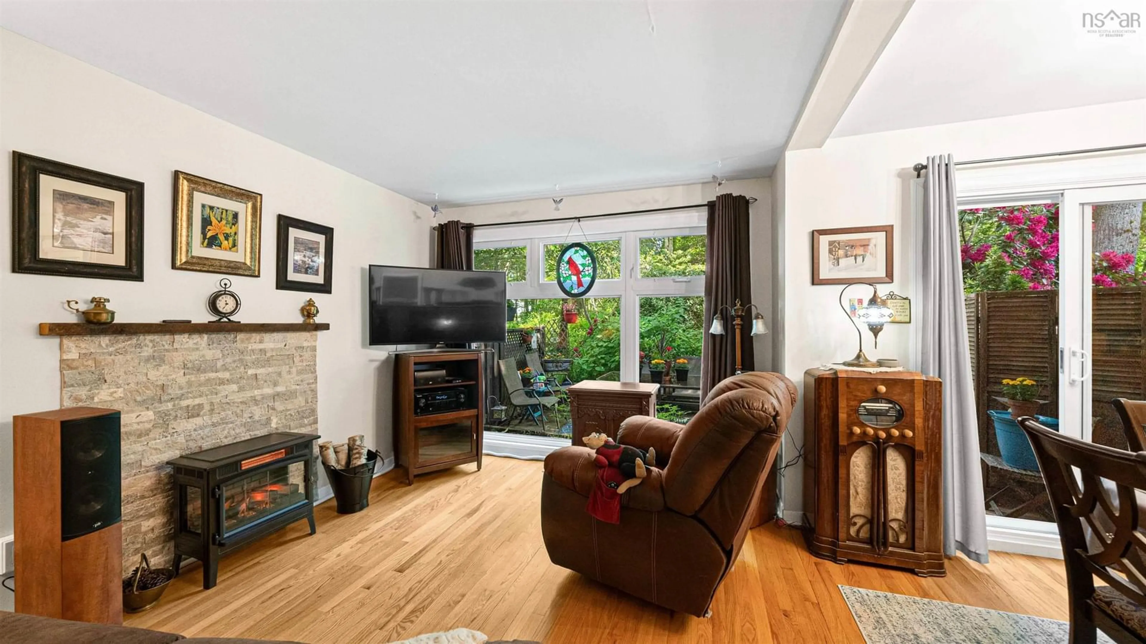 Living room with furniture, wood/laminate floor for 36 Garden Court Terr, Dartmouth Nova Scotia B3A 3S6