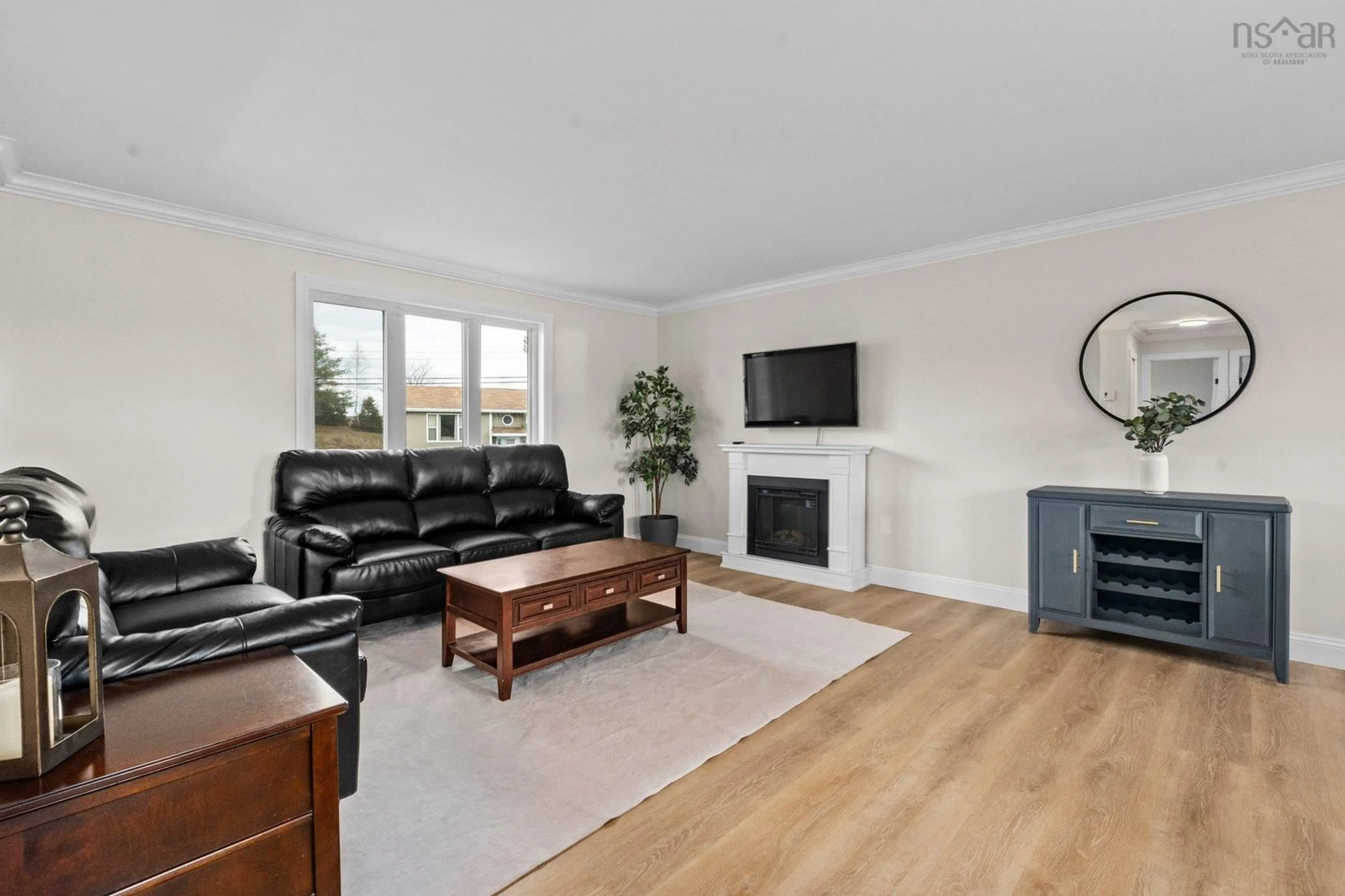 Living room with furniture, wood/laminate floor for 70 Inglewood Cres, Cole Harbour Nova Scotia B2W 5W3