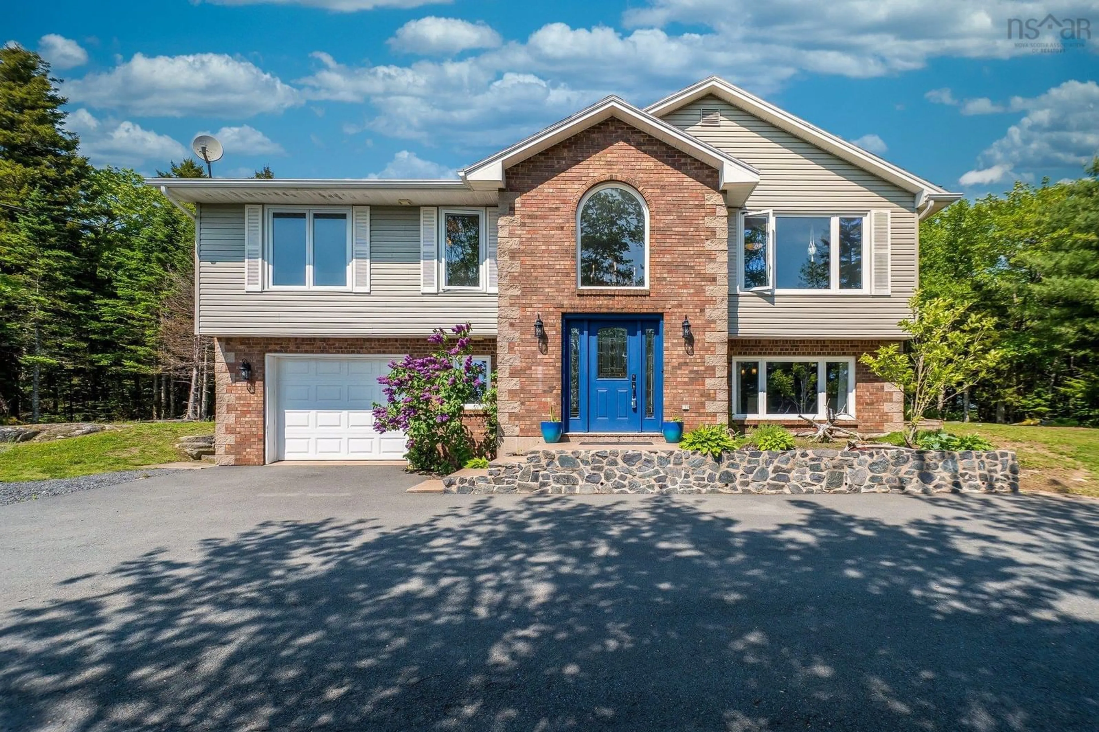 Home with brick exterior material, street for 28 Roupen Crt Crt, Hammonds Plains Nova Scotia B4B 1L2