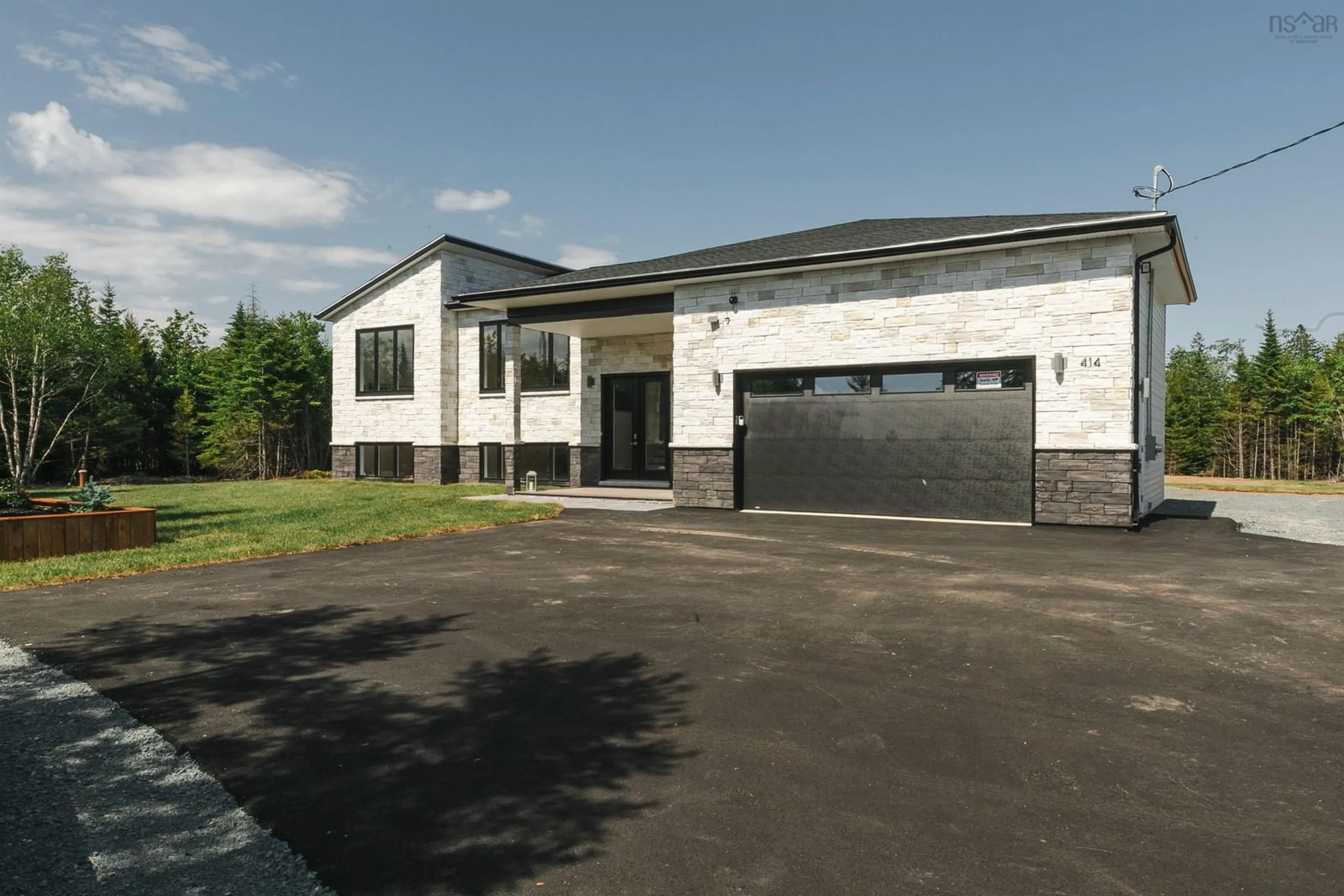 A pic from outside/outdoor area/front of a property/back of a property/a pic from drone, building for 414 Canoe Cres, Hammonds Plains Nova Scotia B4B 2P5