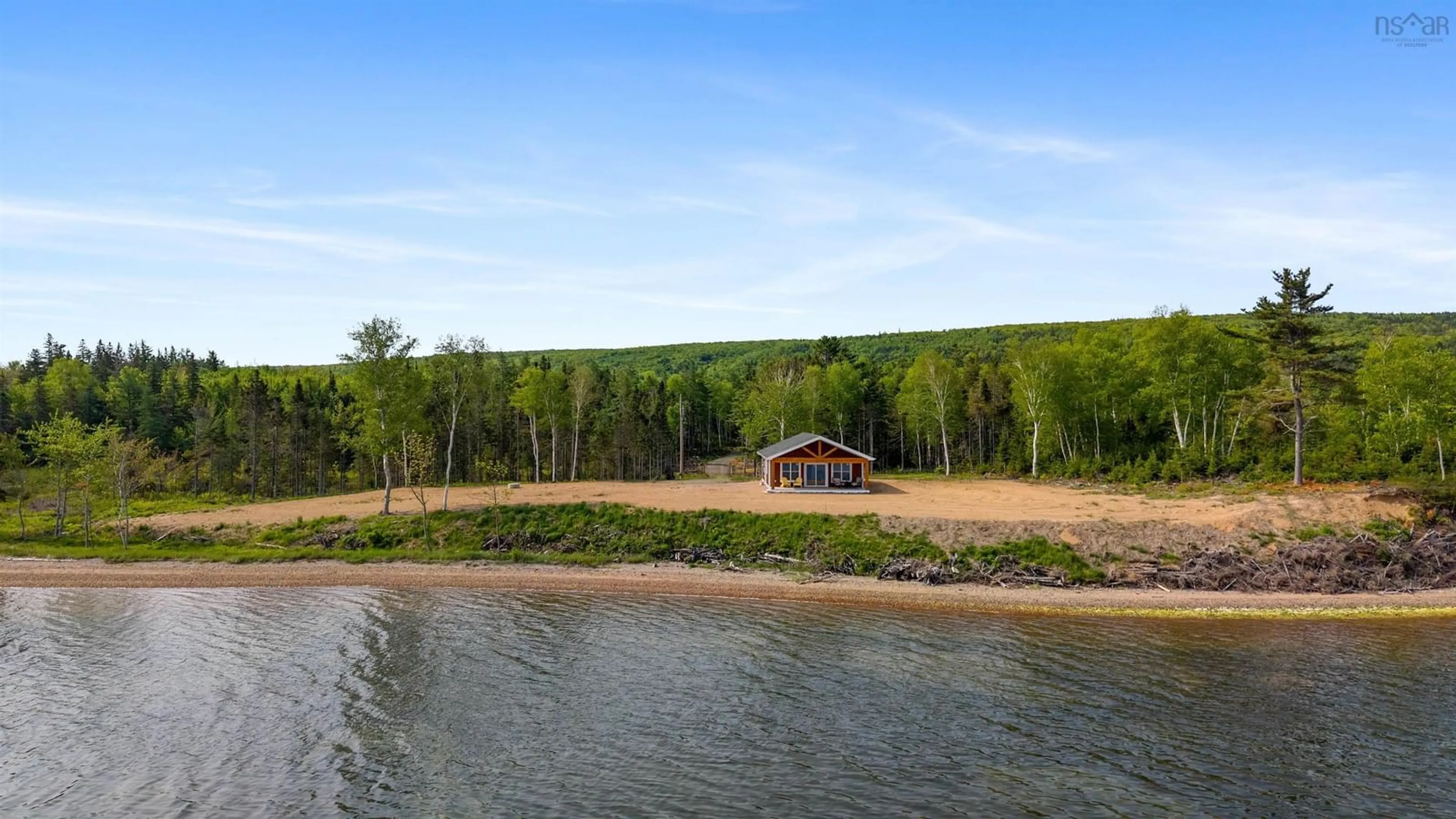 A pic from outside/outdoor area/front of a property/back of a property/a pic from drone, water/lake/river/ocean view for 134 Malagawatch Cemetery Rd, River Denys Nova Scotia B0E 2Y0