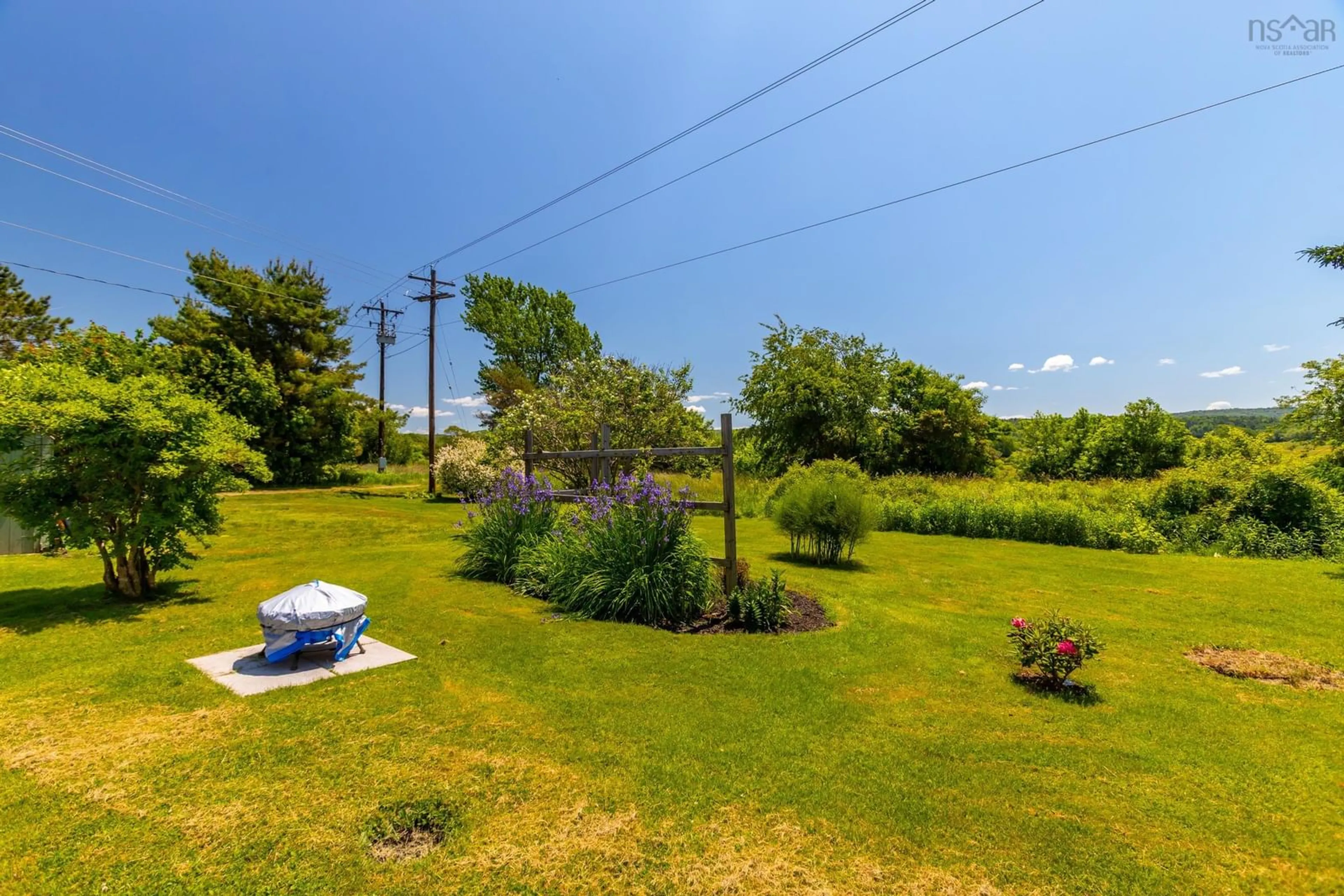 A pic from outside/outdoor area/front of a property/back of a property/a pic from drone, water/lake/river/ocean view for 78 Riverview Dr, Bridgetown Nova Scotia B0S 1C0