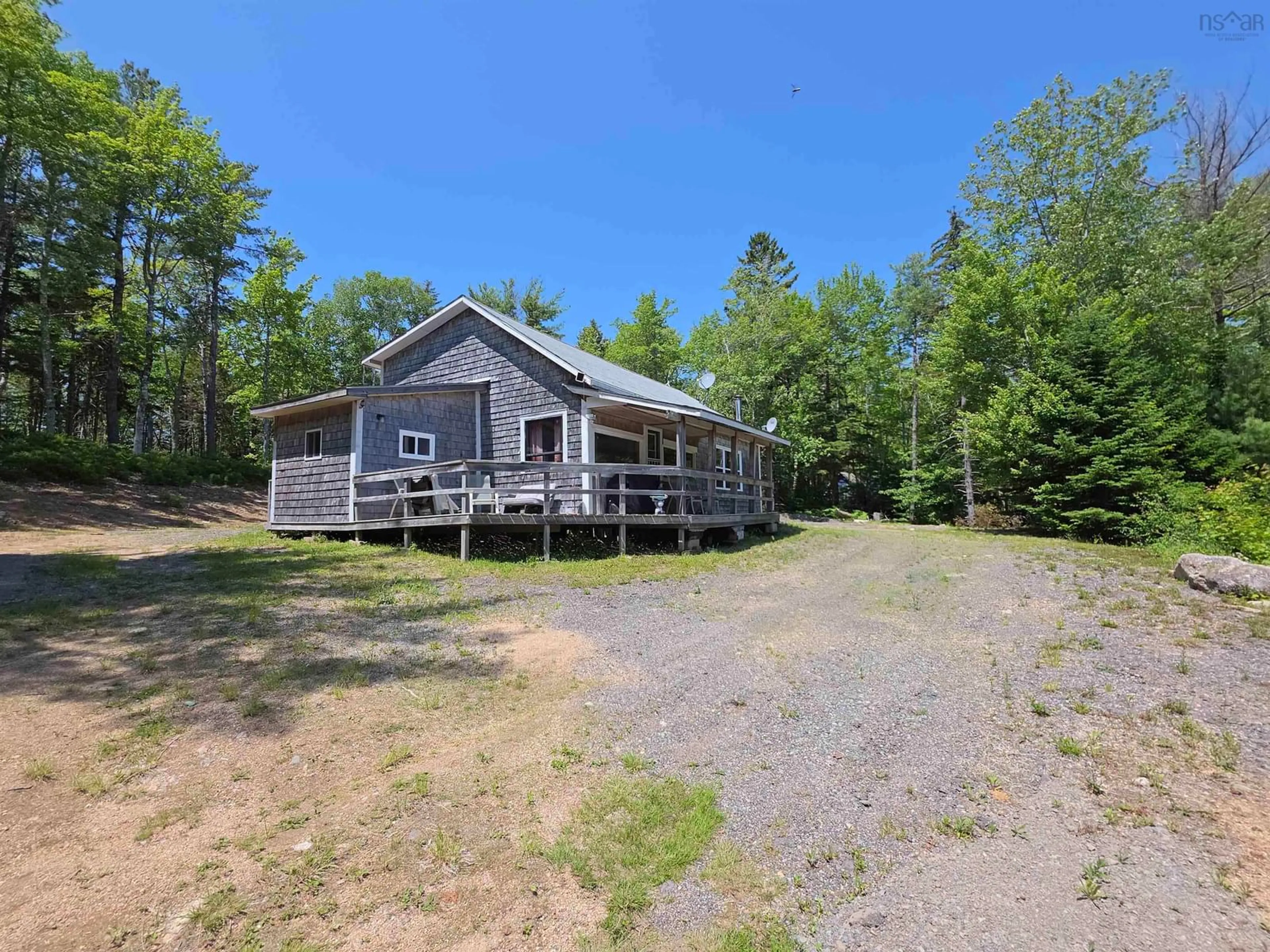 A pic from outside/outdoor area/front of a property/back of a property/a pic from drone, water/lake/river/ocean view for 510 Tom Wallace Rd, Morganville Nova Scotia B0S 1B0